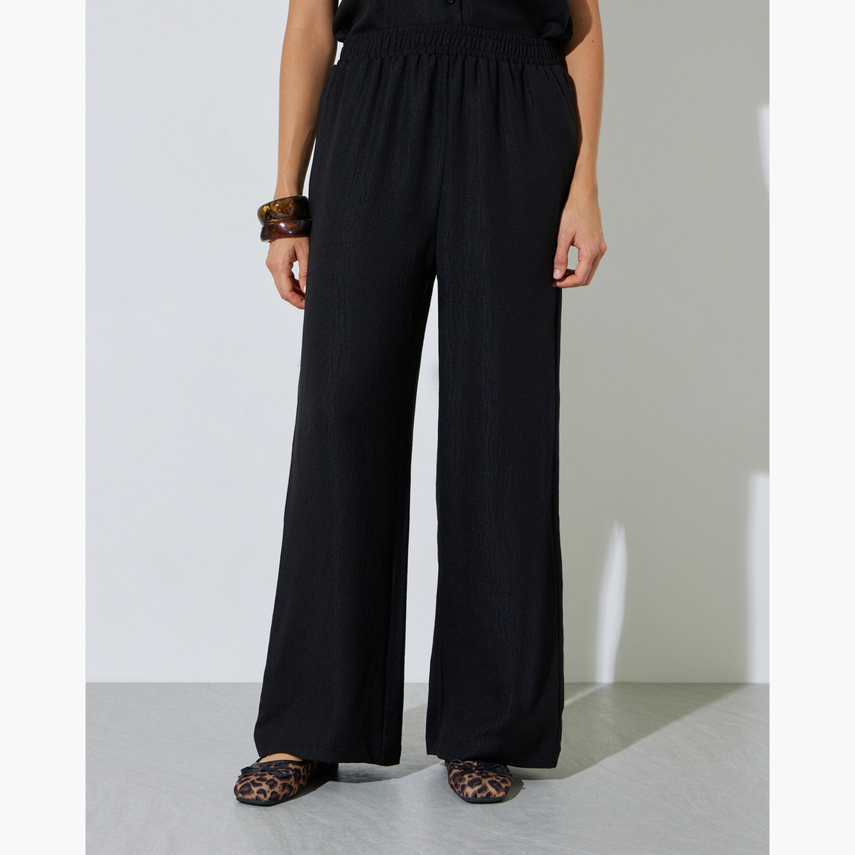 ستايلي - طقم مكون من بلوزة سوداء سادة بأكمام قصيرة مع حزام وبنطال واسع الساقين-women-clothing-coordsets-image-4