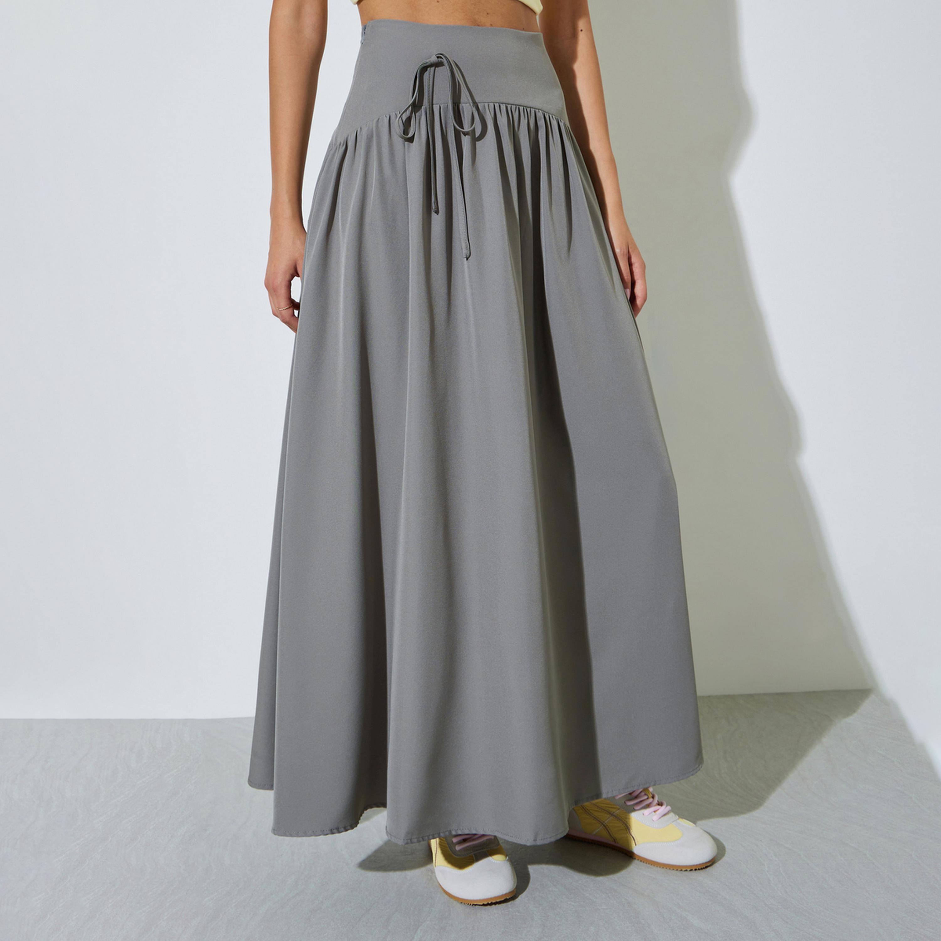 تنورة طويلة بحافة واسعة وتفاصيل أربطة-women-clothing-bottoms-skirts-image-1
