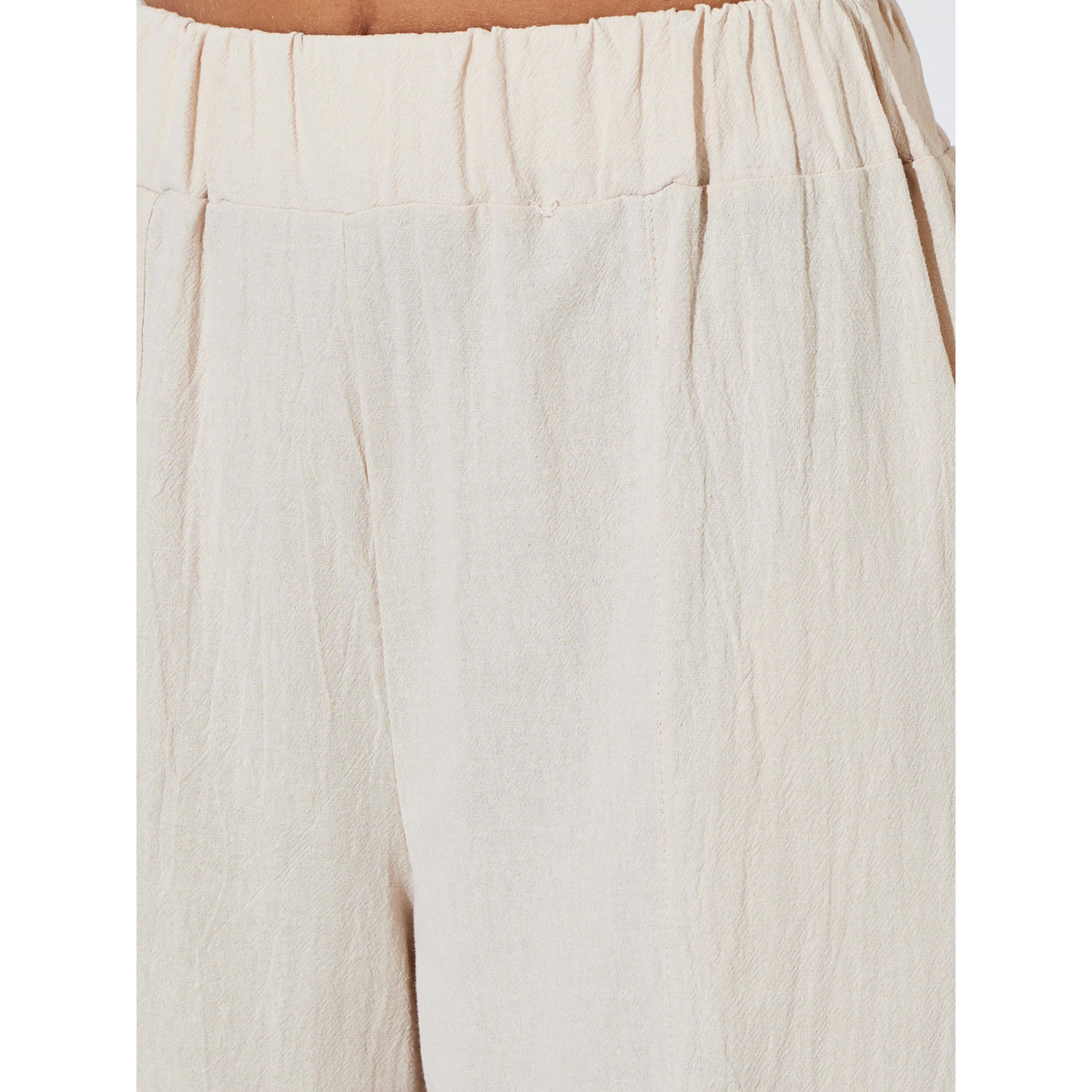 بنطال مدبب بتكسيرات وأرجل عريضة بارز الملمس بيج-women-clothing-joggers-image-4