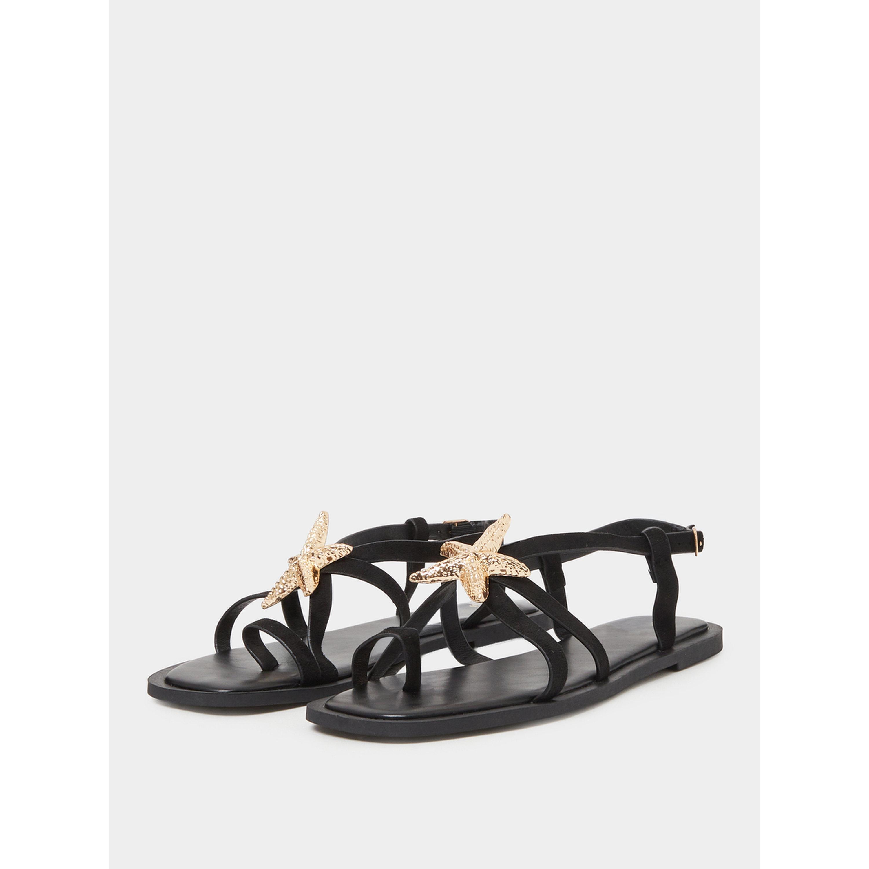 صندل فلات مزين بنجم البحر باللون الأسود-women-shoes-sandals-flats-image-1