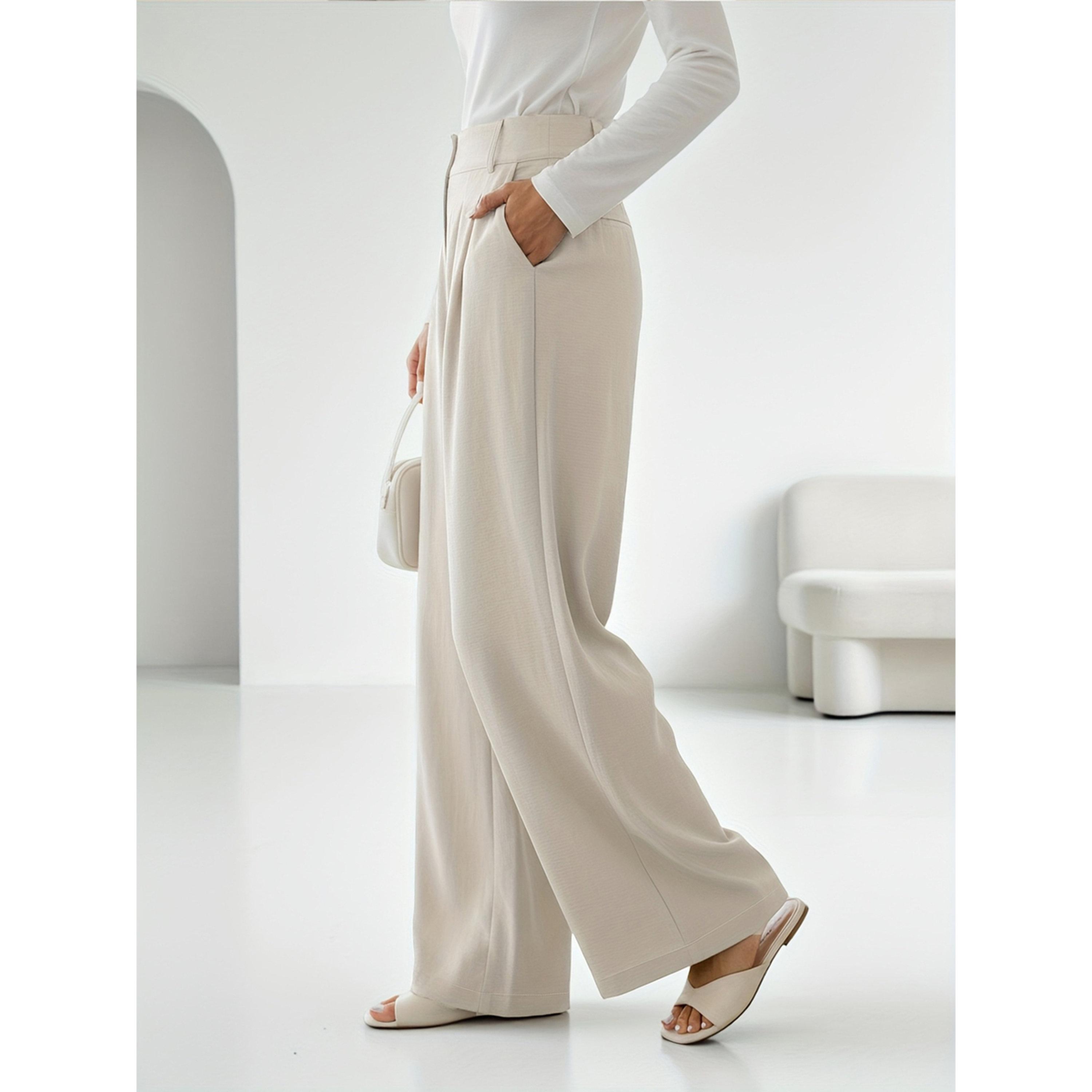 بنطال بالازو بكسرات وأرجل واسعة بلون سادة-women-clothing-trousers-image-3