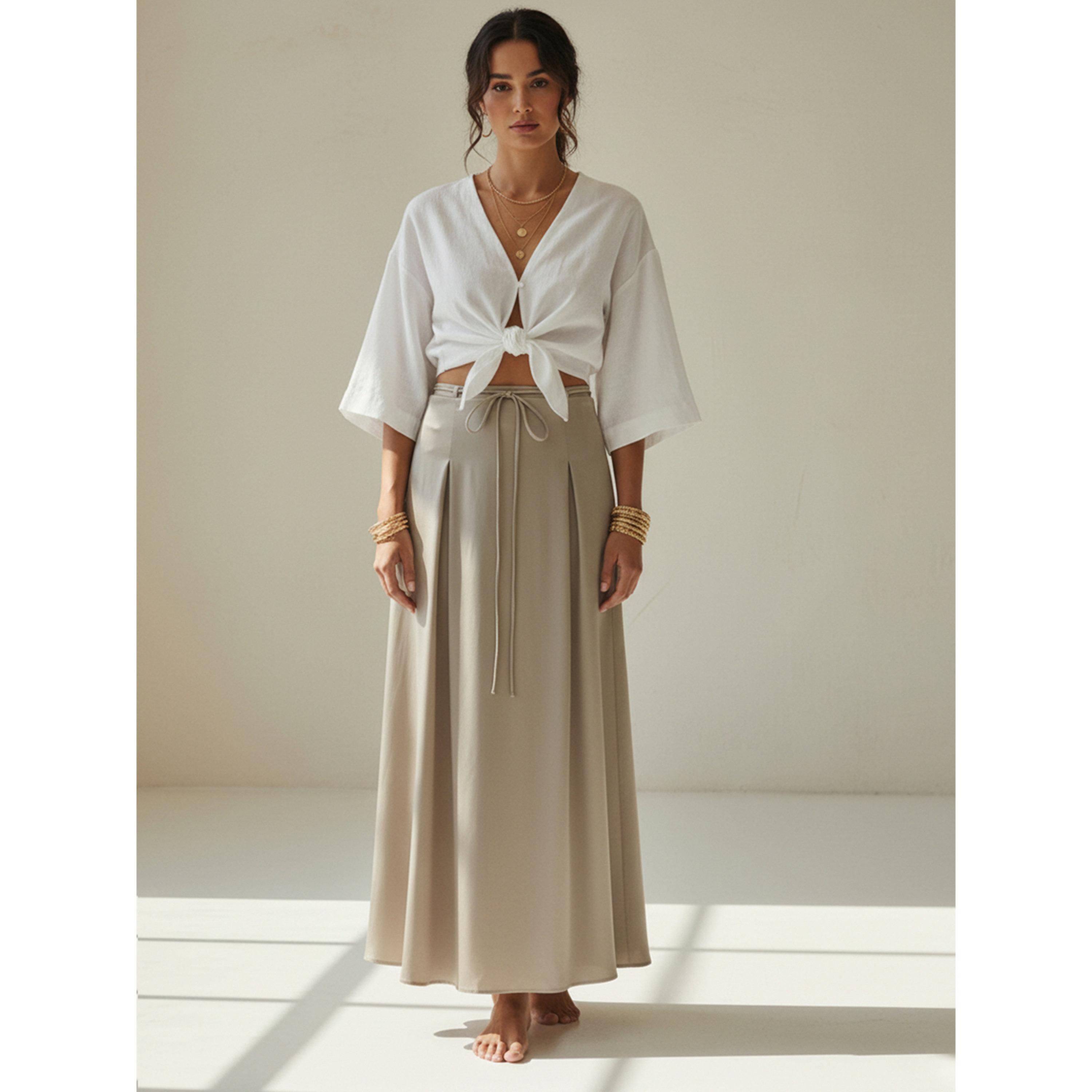 تنورة طويلة بحافة واسعة وتفاصيل كسرات ورابطة خصر باللون البيج-women-clothing-skirts-image-2
