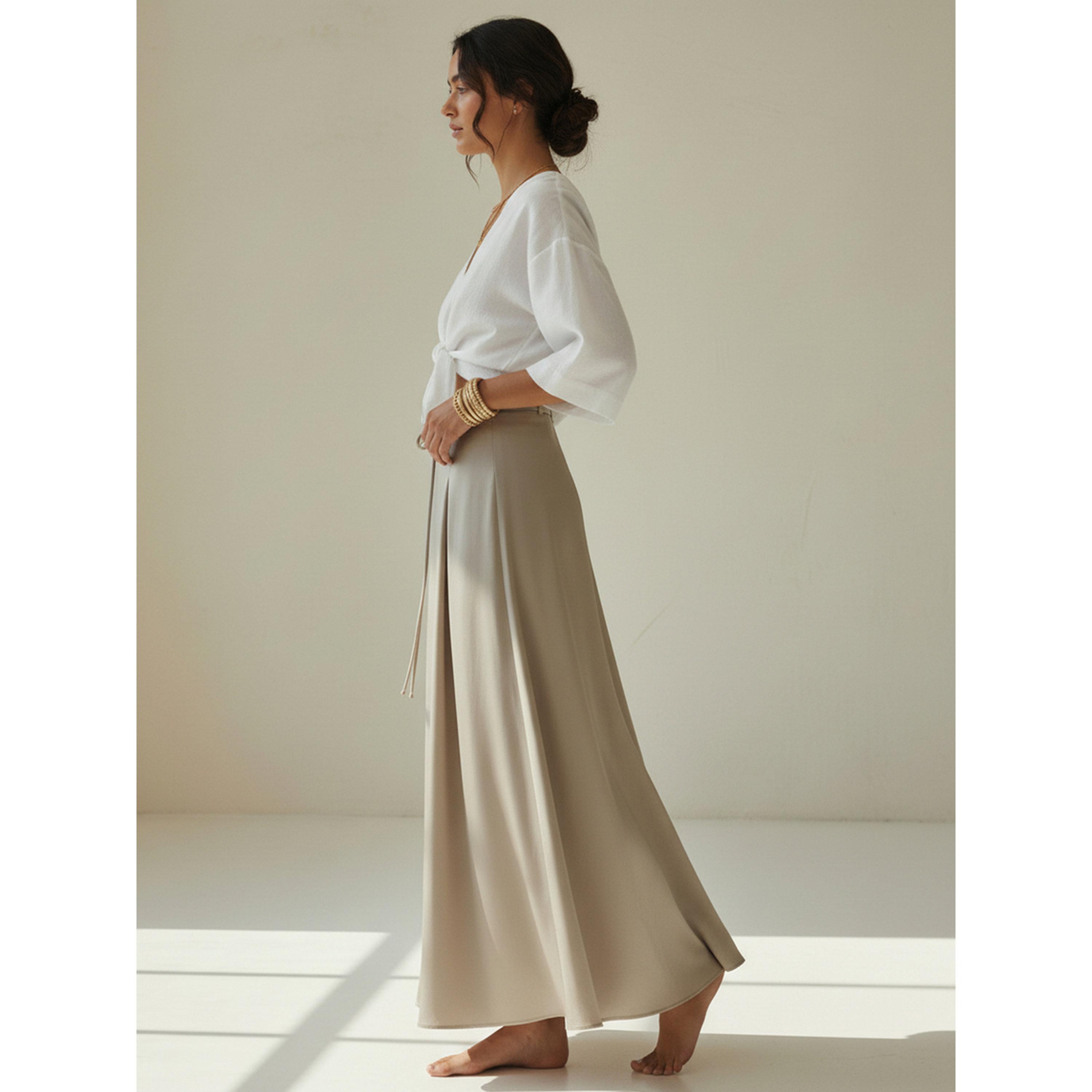 تنورة طويلة بحافة واسعة وتفاصيل كسرات ورابطة خصر باللون البيج-women-clothing-skirts-image-5