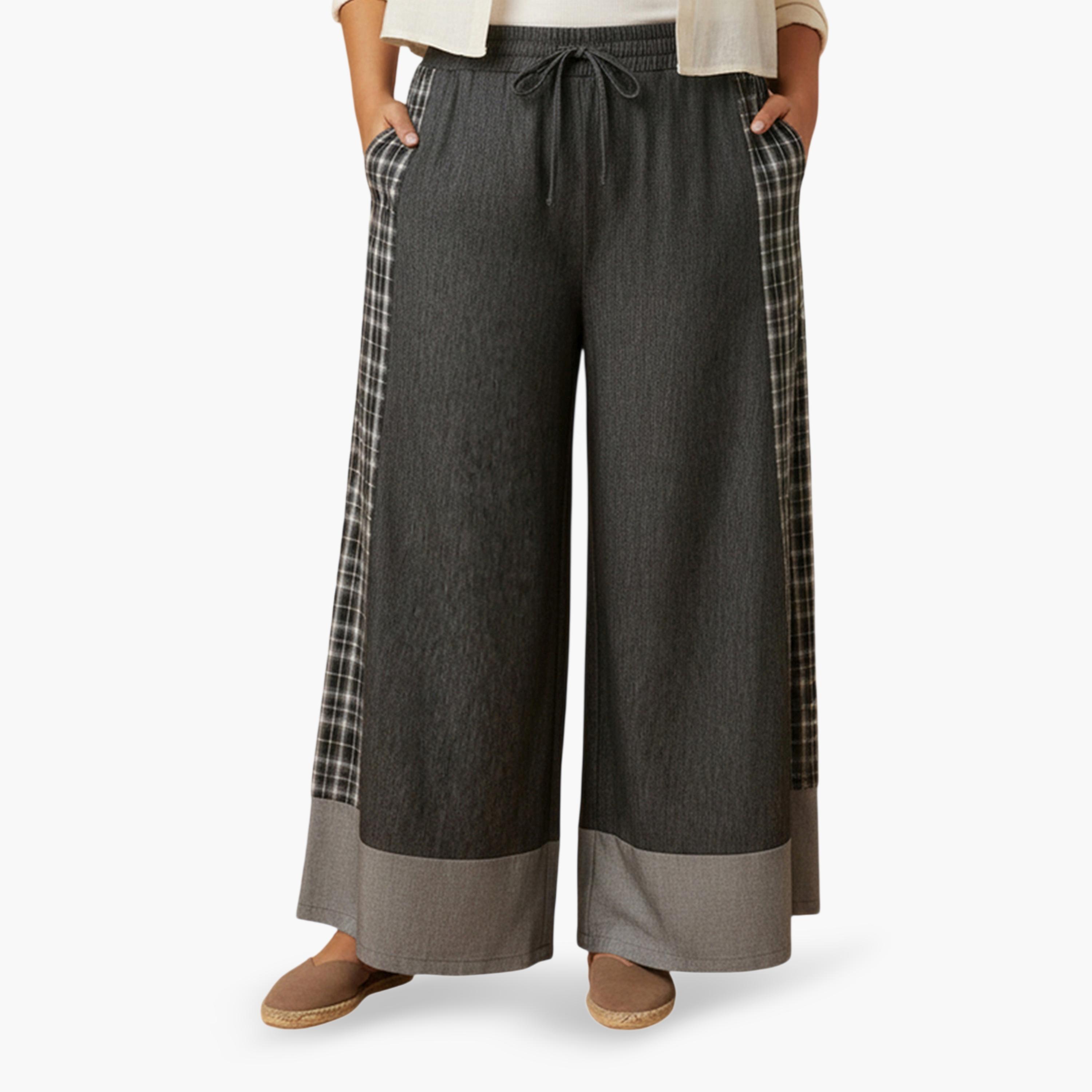 بنطال بأرجل واسعة بخصر مطاطي بمقاس كبير باللون الأسود-women-clothing-plussize-joggers-image-1
