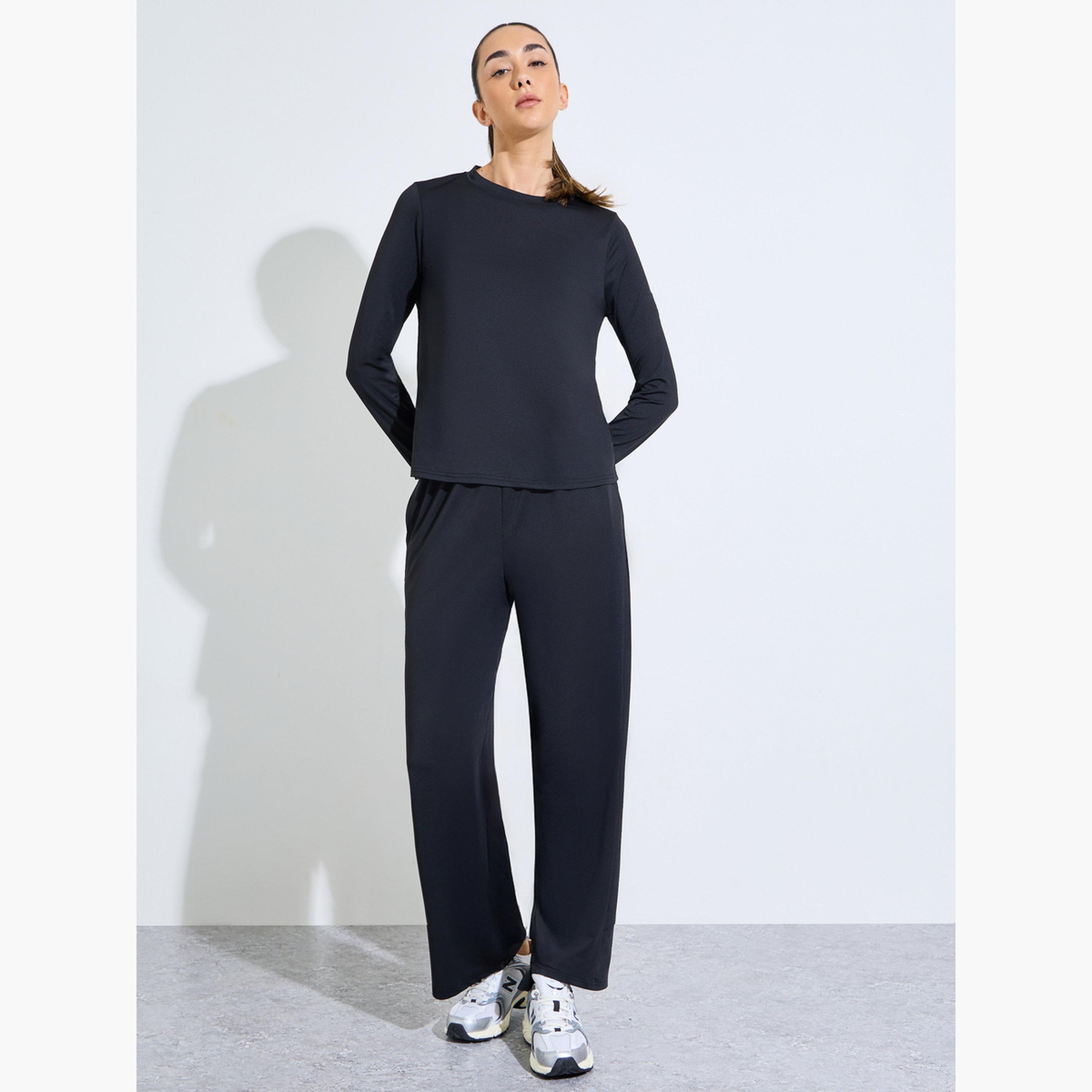 ستايلي - طقم أسود فضفاض مكون من بلوزة وبنطال مستقيم مع فتحة للإبهام-sports-women-clothing-trackpantsandtracksuits-image-1
