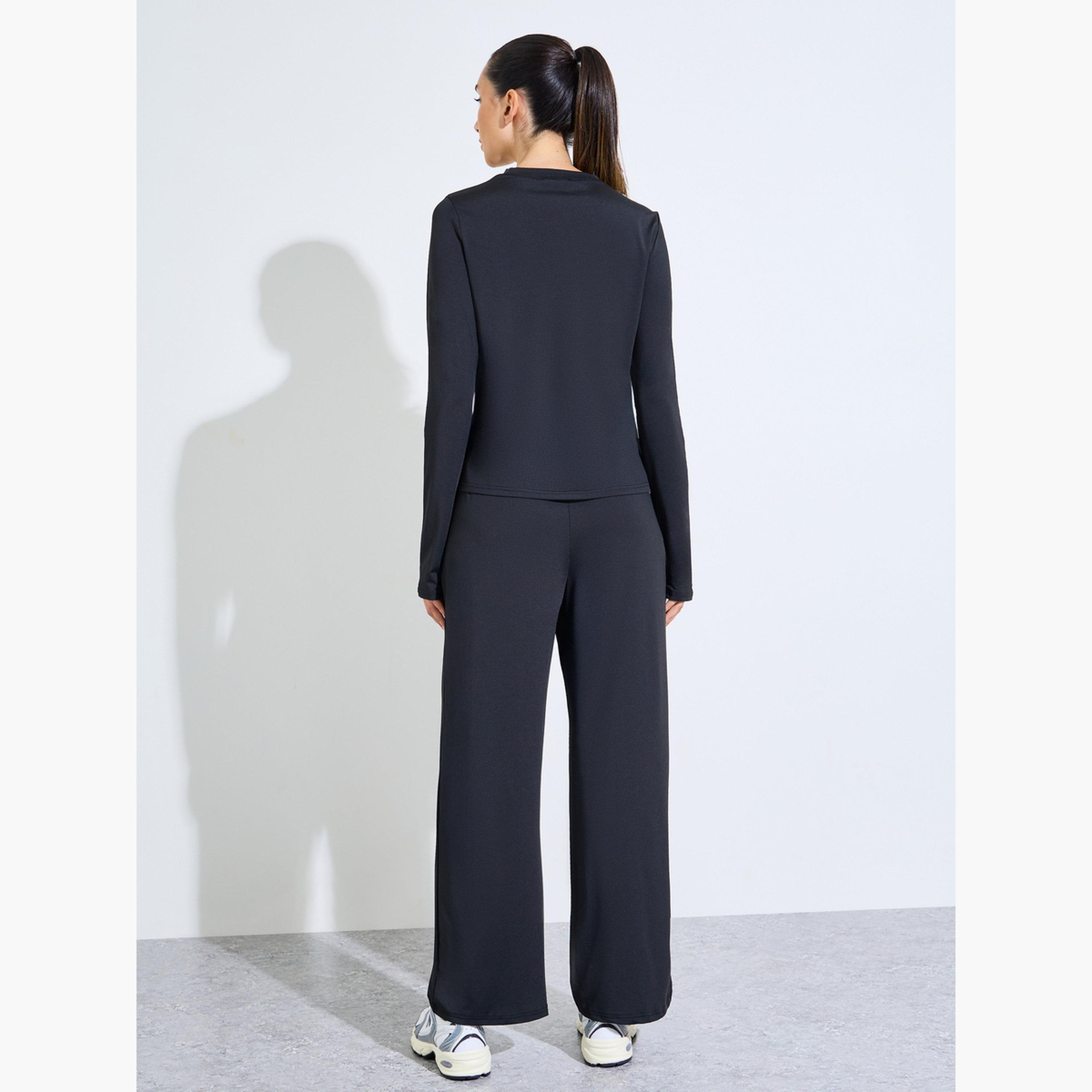 ستايلي - طقم أسود فضفاض مكون من بلوزة وبنطال مستقيم مع فتحة للإبهام-sports-women-clothing-trackpantsandtracksuits-image-3