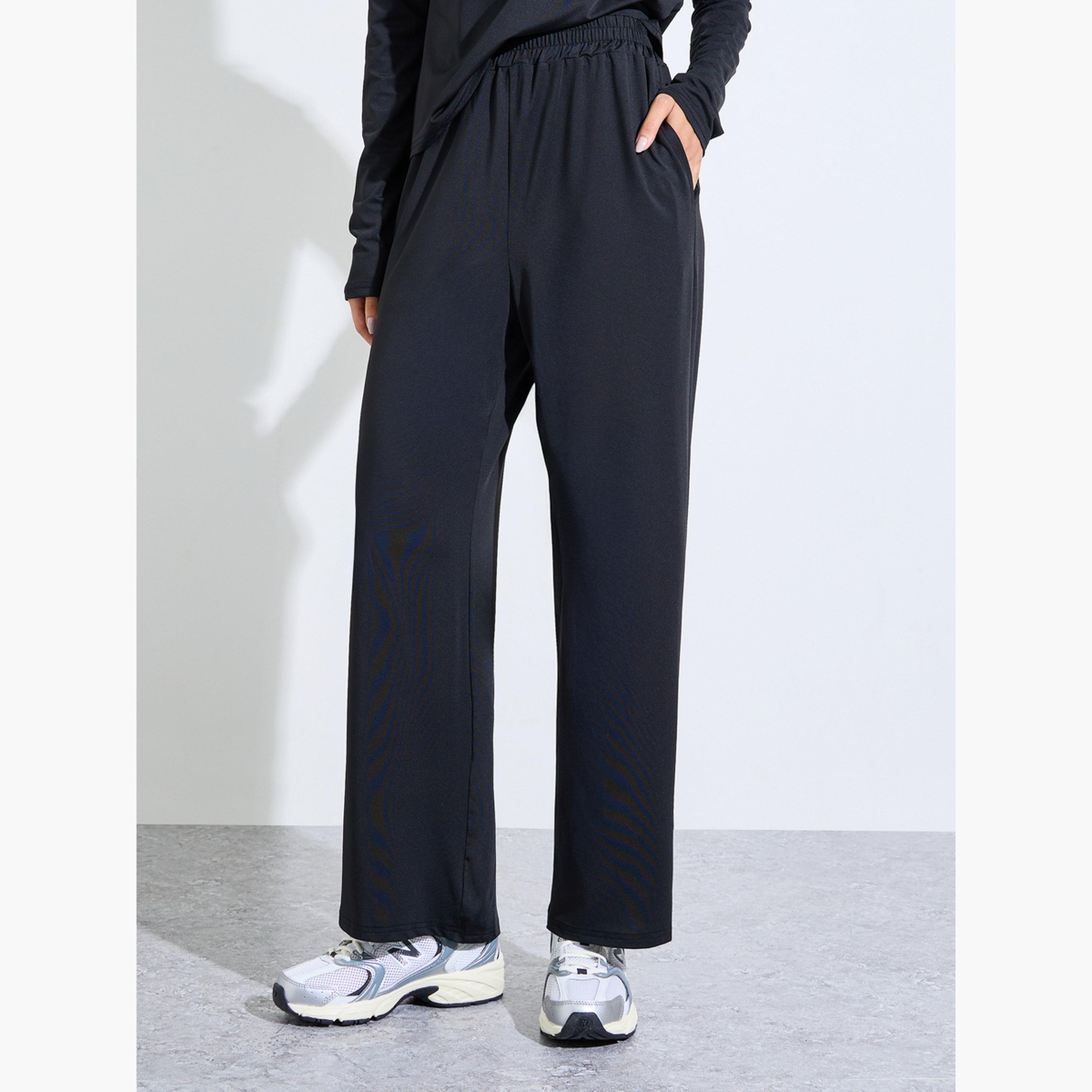 ستايلي - طقم أسود فضفاض مكون من بلوزة وبنطال مستقيم مع فتحة للإبهام-sports-women-clothing-trackpantsandtracksuits-image-4