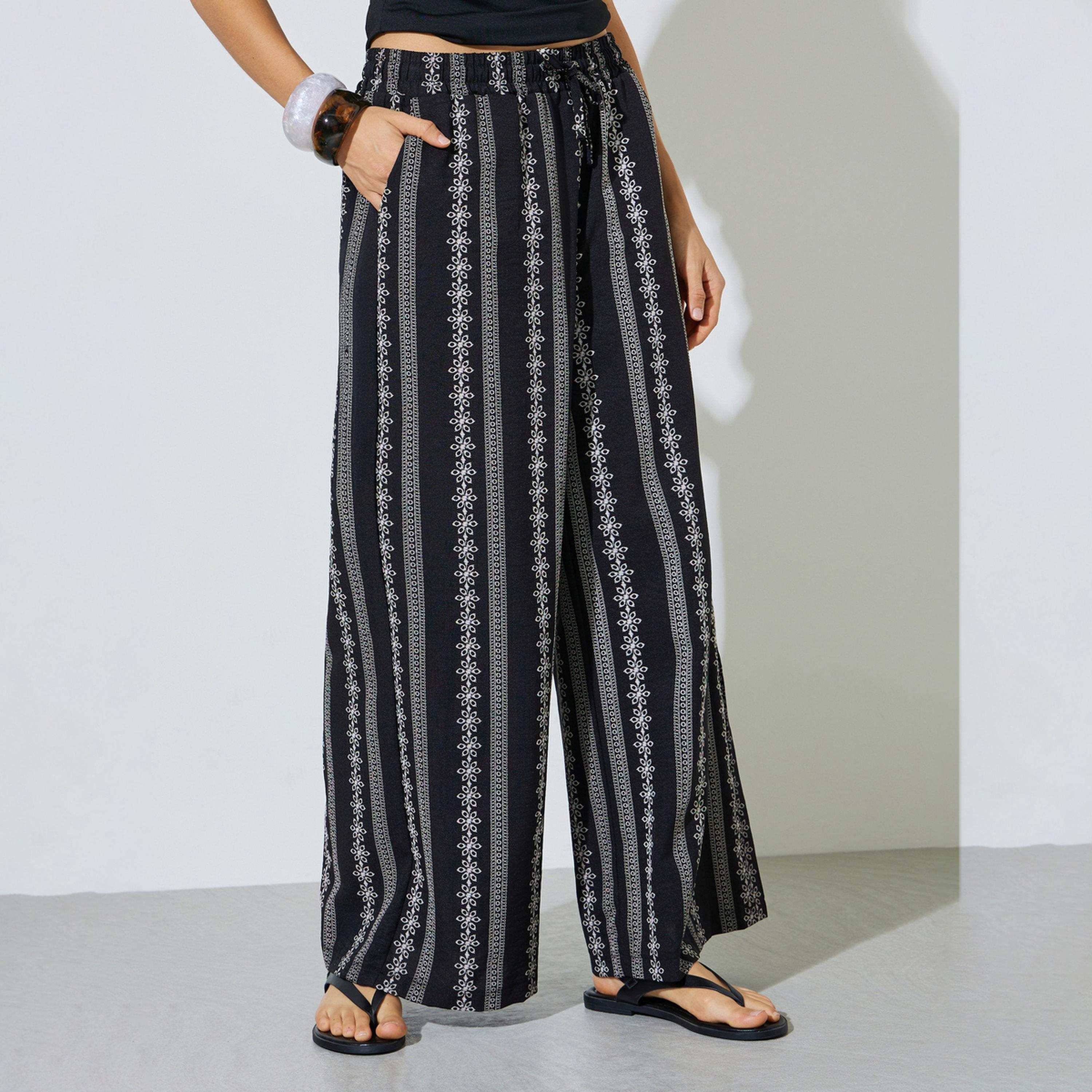 ستايلي - بنطال بالازو أسود واسع الساقين مطرز-women-clothing-bottoms-joggers-image-1