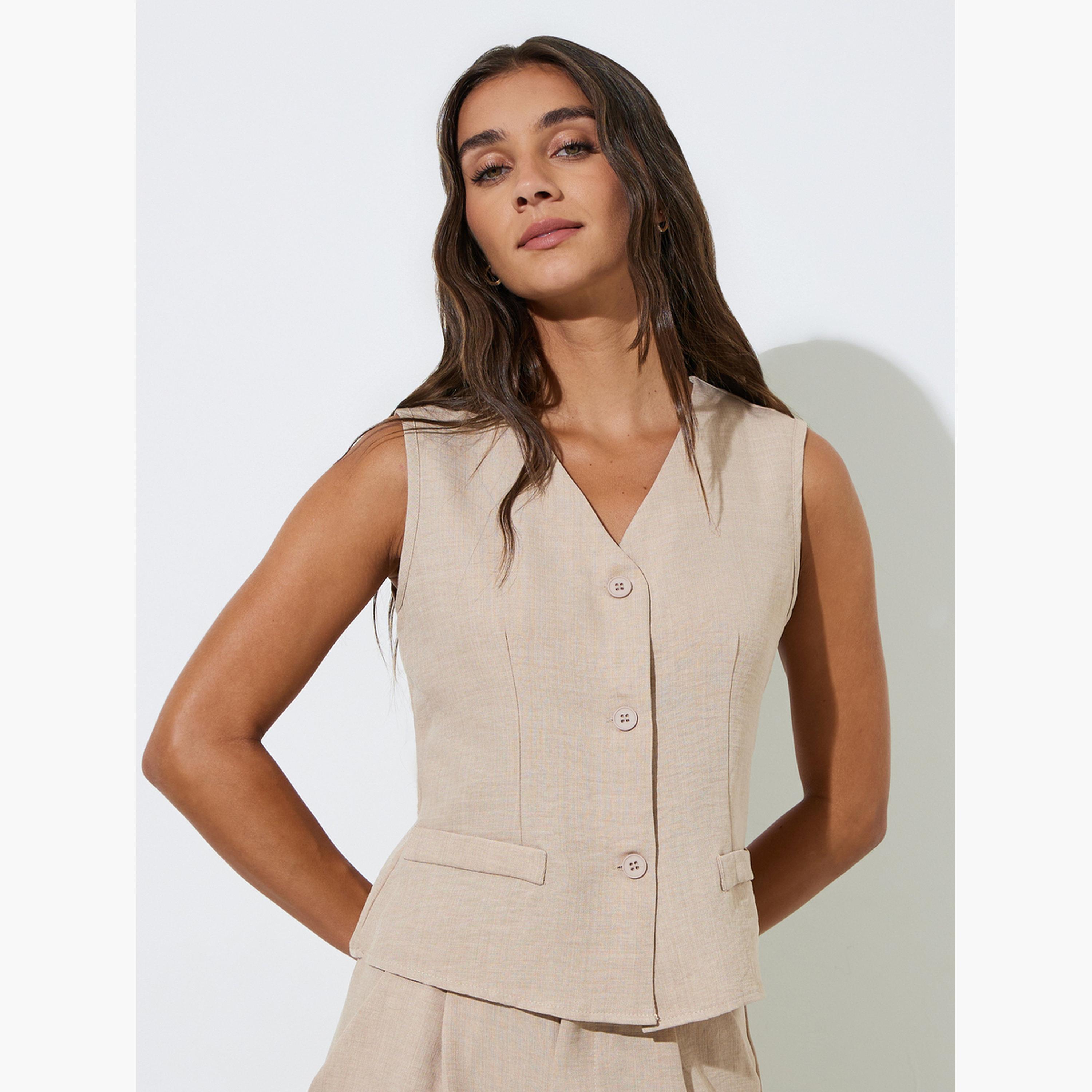 طقم منسق من بنطال بأرجل واسعة وفيست بلون سادة لون بيج-women-clothing-coordsets-image-2