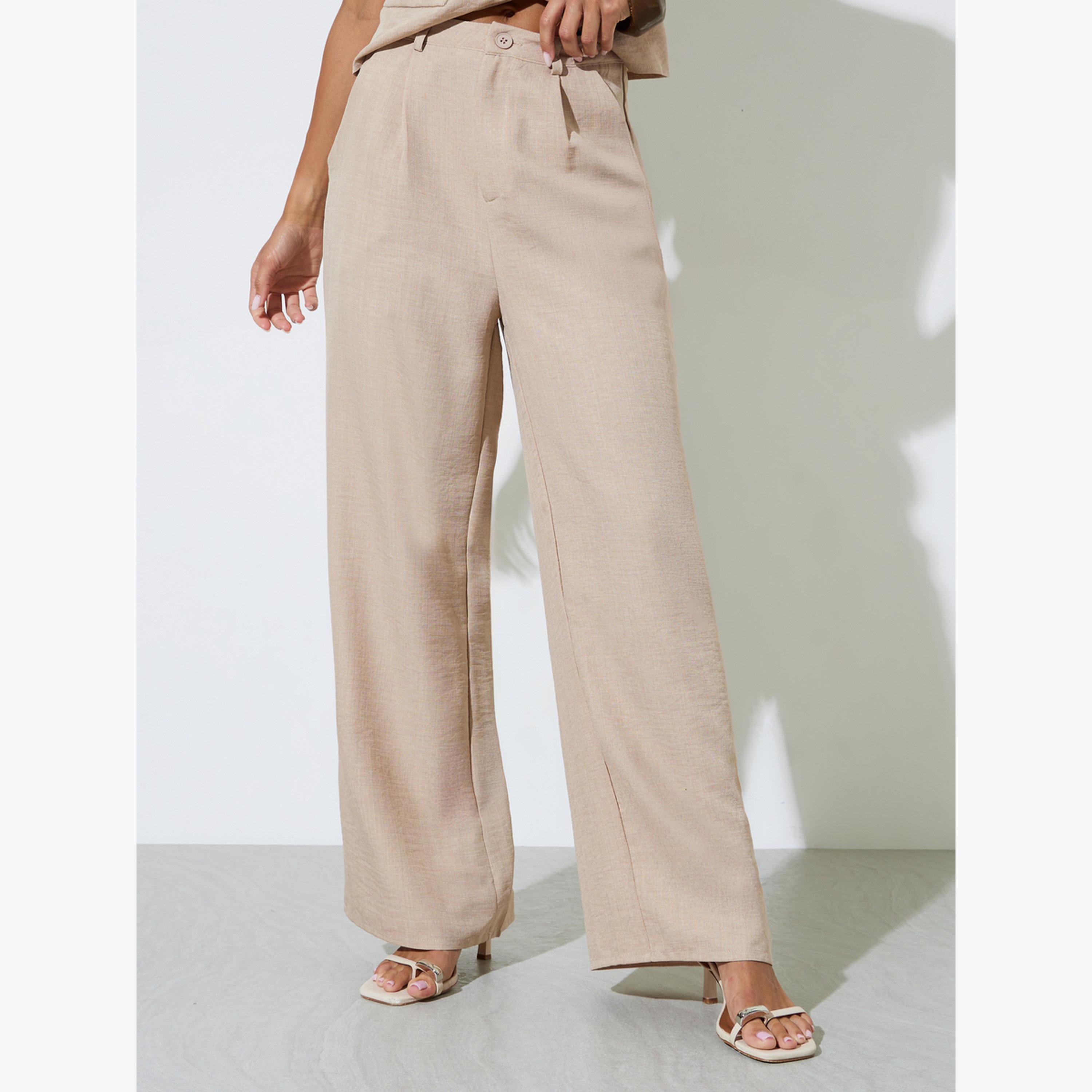 طقم منسق من بنطال بأرجل واسعة وفيست بلون سادة لون بيج-women-clothing-coordsets-image-5