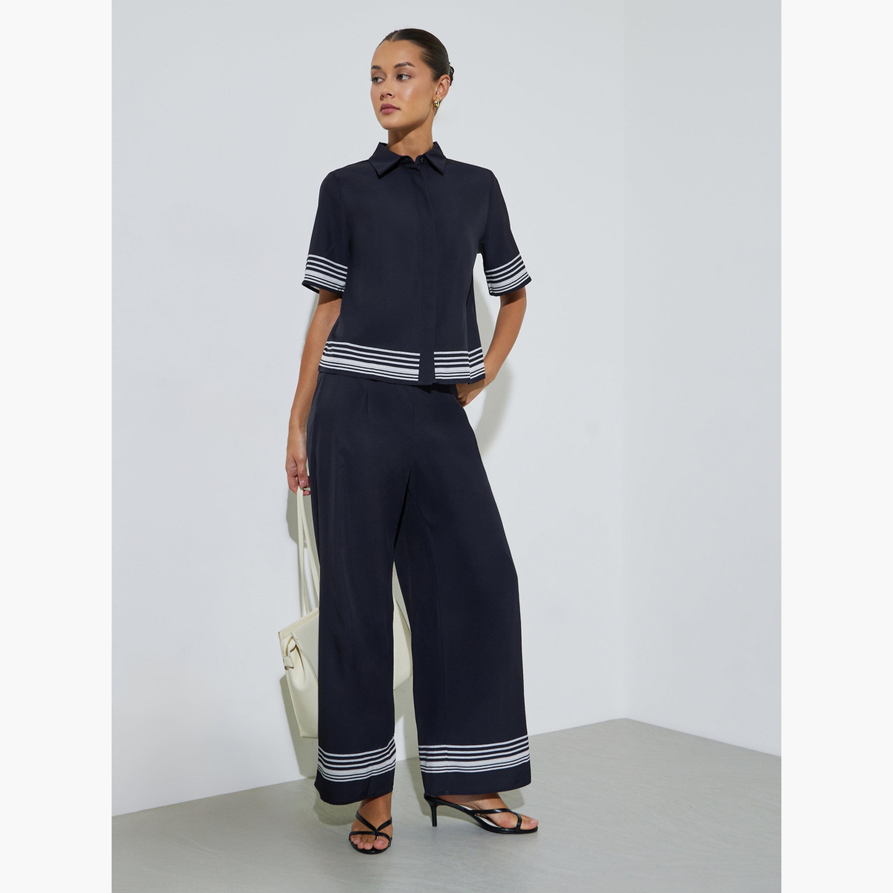 بنطال بأرجل واسعة وحافة مخطط لون أسود-women-clothing-bottoms-joggers-image-5