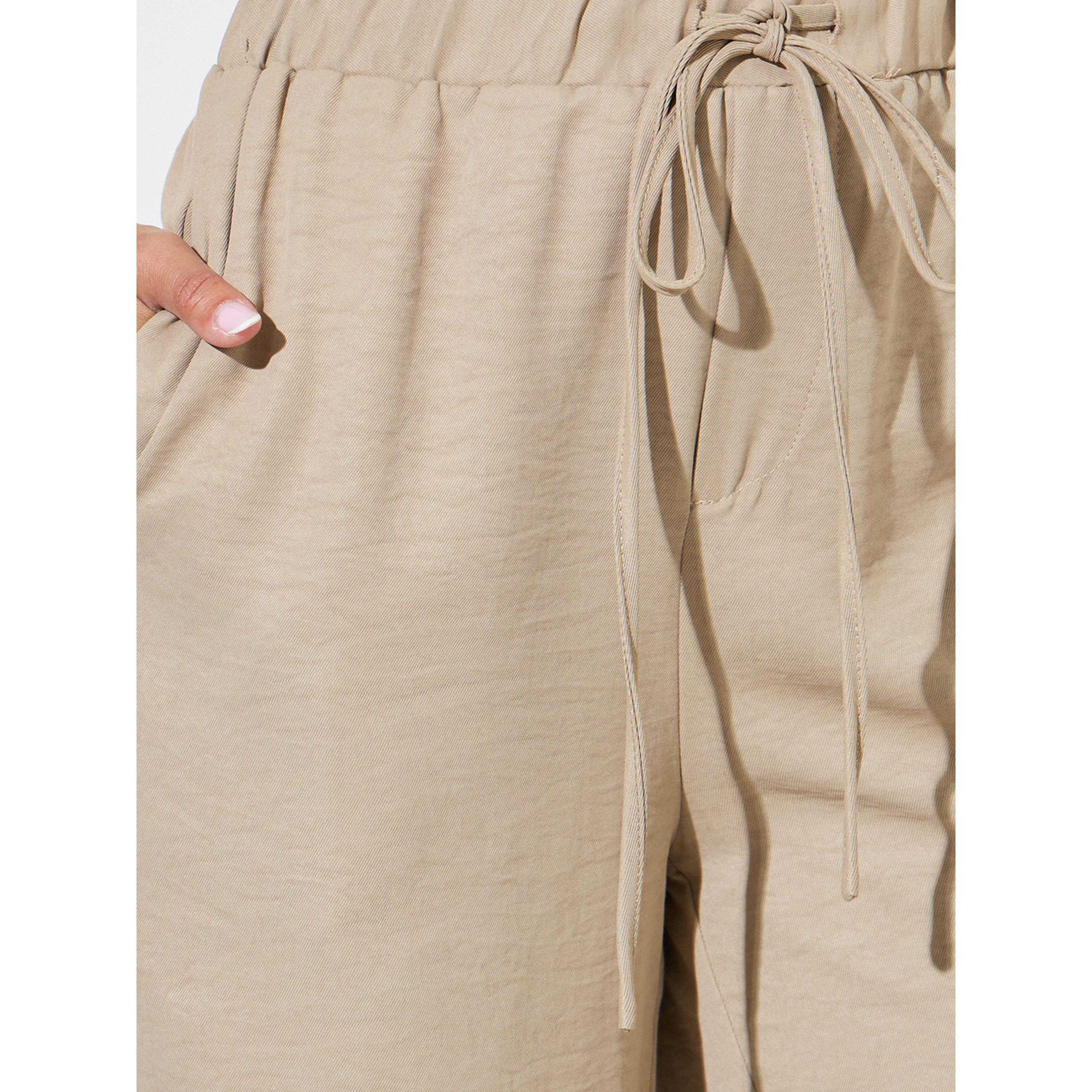 Styli Beige Solid Wide Leg Drawstring Trousers-women-clothing-joggers-image-3