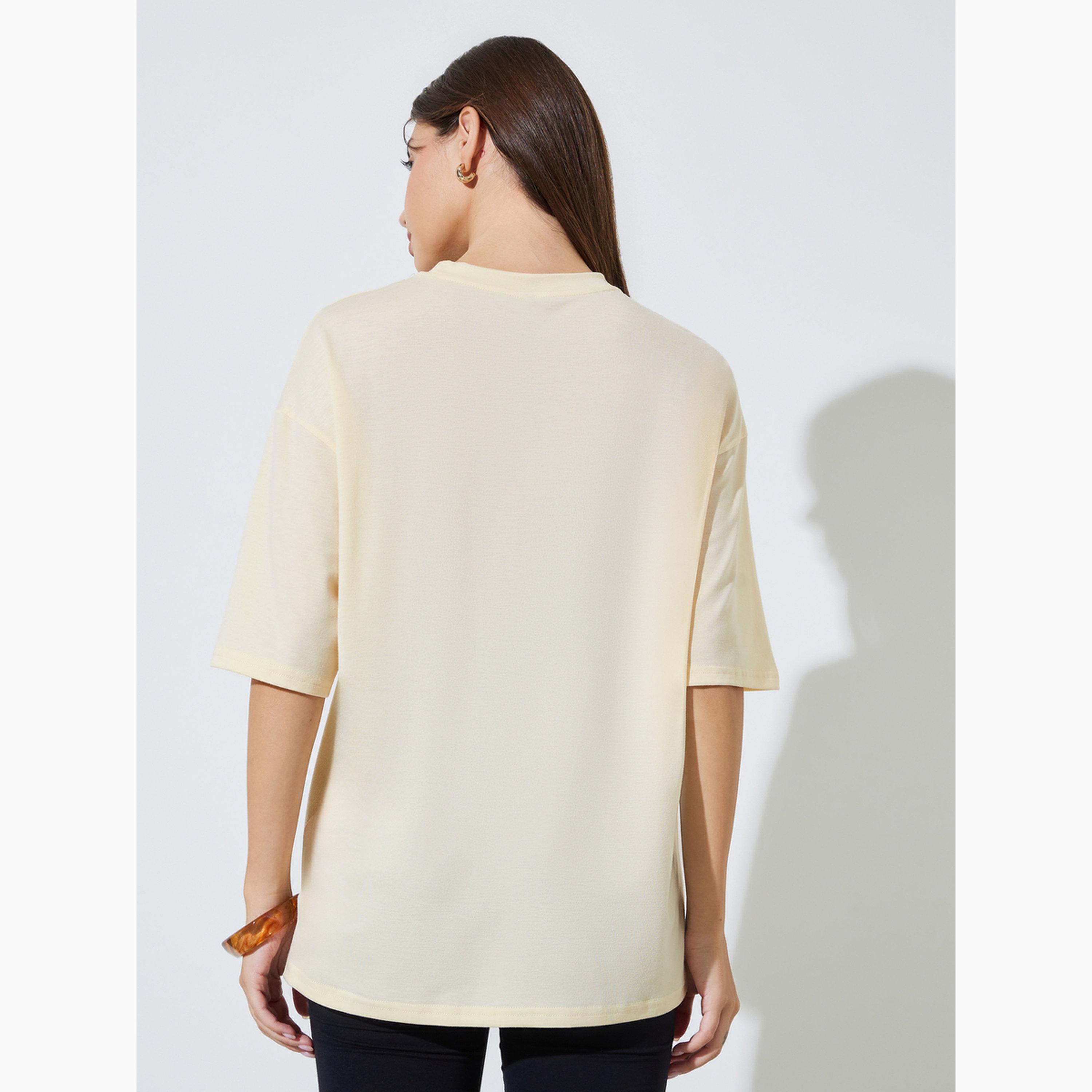 تيشيرت واسع وطبعة جرافيك-women-clothing-tshirts-image-4