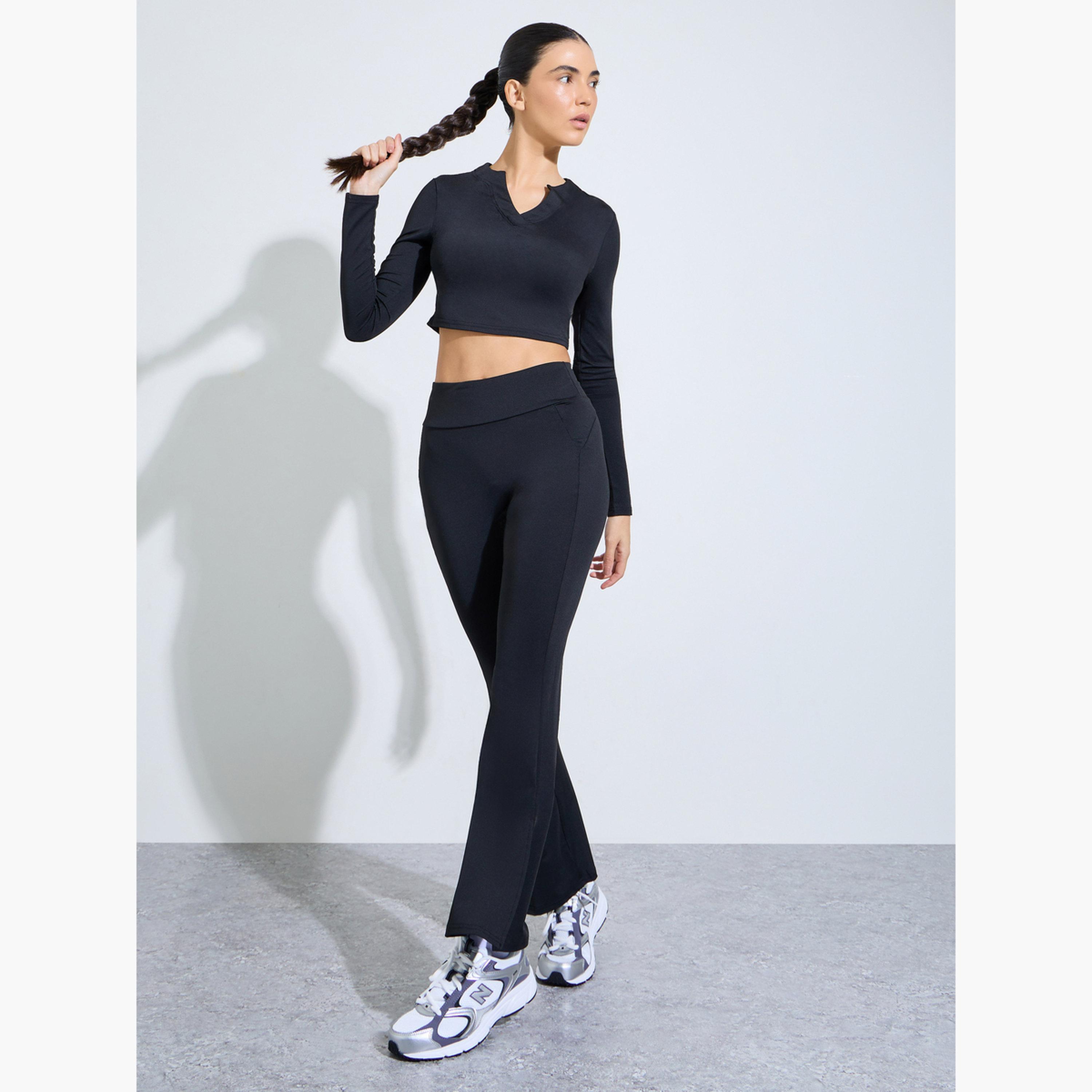 طقم من ليقنز واسع وبلوزة قصيرة بفتحة رقبة-women-clothing-coordsets-image-1