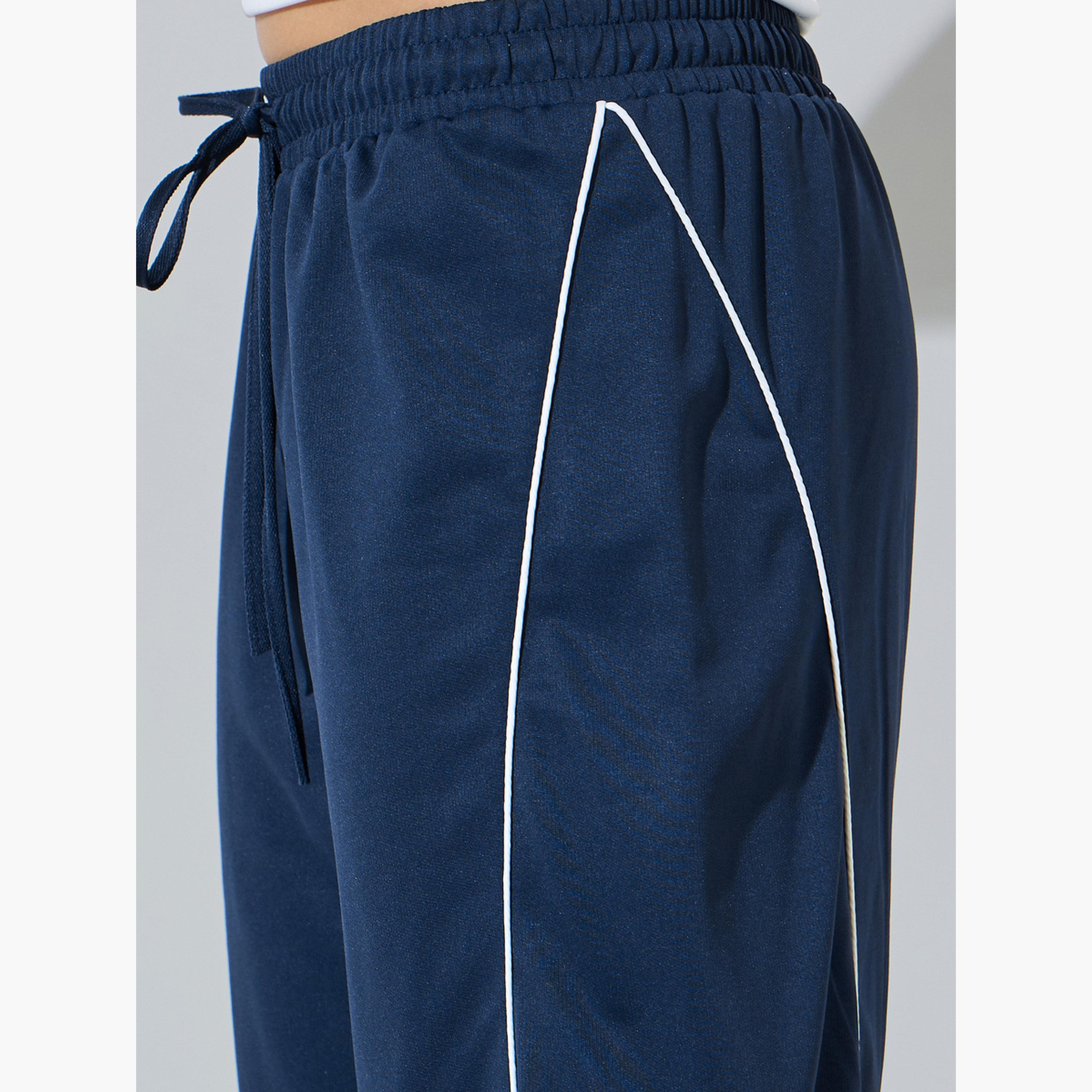 ستايلي - بنطال رياضي واسع الساقين بلون أزرق داكن مع خط جانبي-women-clothing-bottoms-joggers-image-4