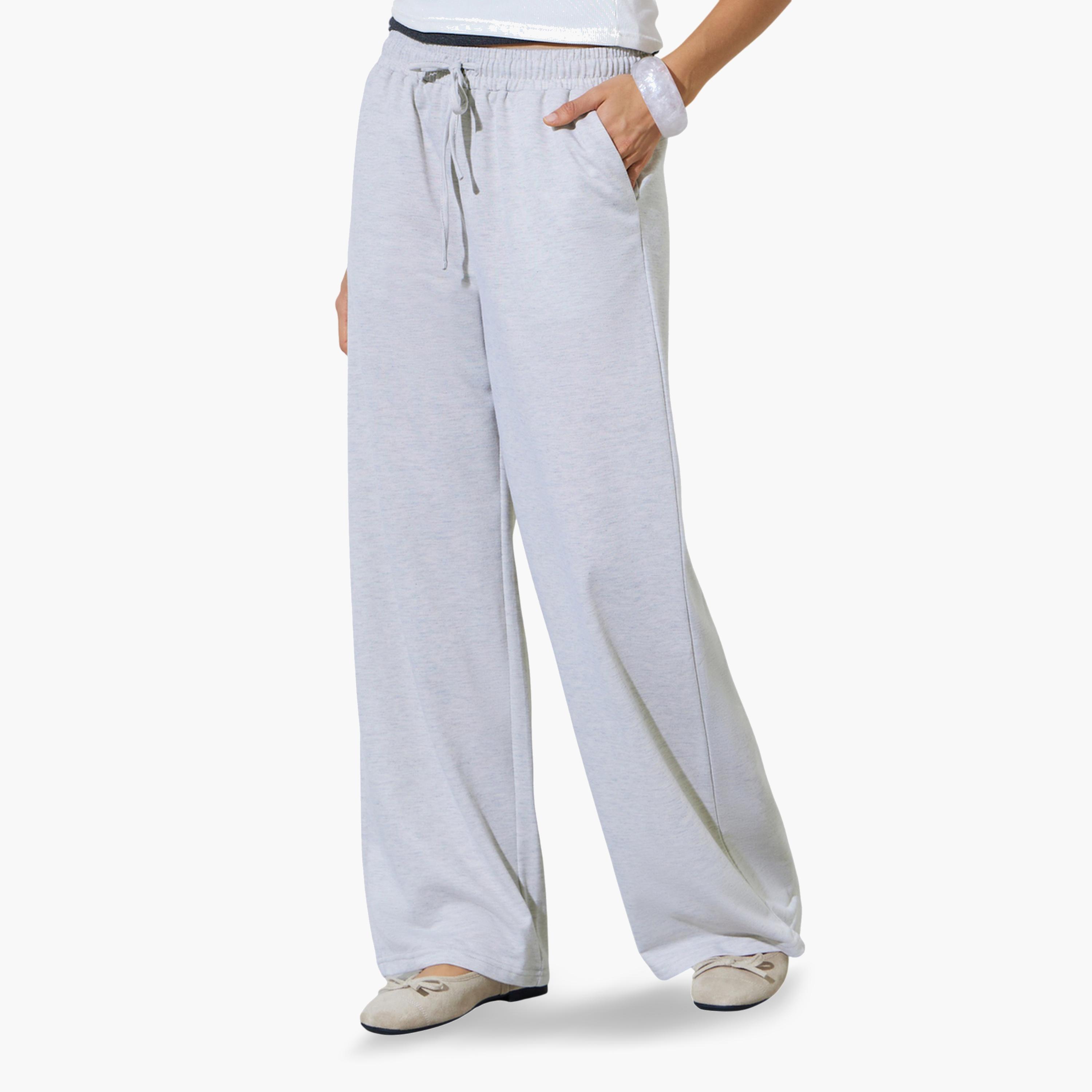 ستايلي - بنطال رياضي واسع الساقين بلون متين مع جيب-women-clothing-bottoms-joggers-image-1