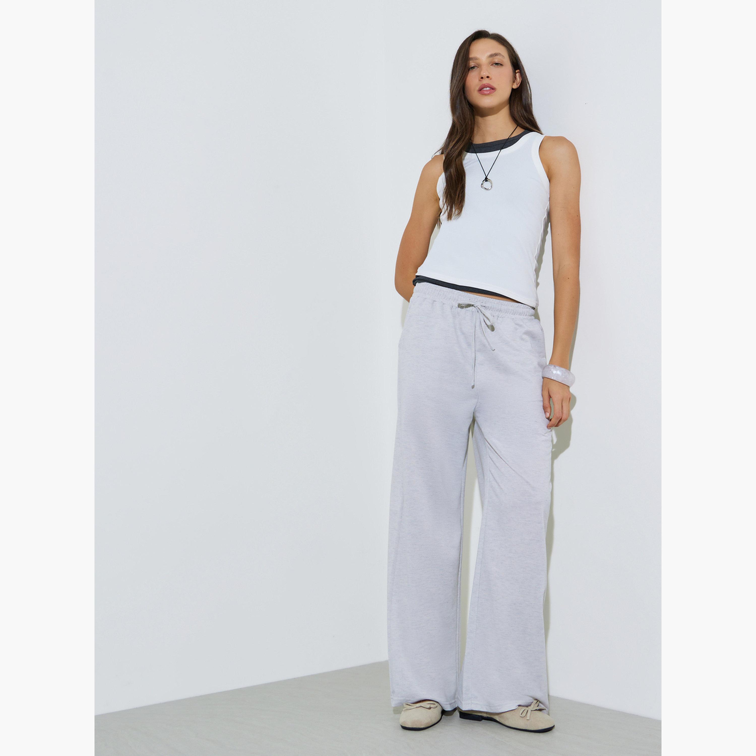 ستايلي - بنطال رياضي واسع الساقين بلون متين مع جيب-women-clothing-bottoms-joggers-image-2