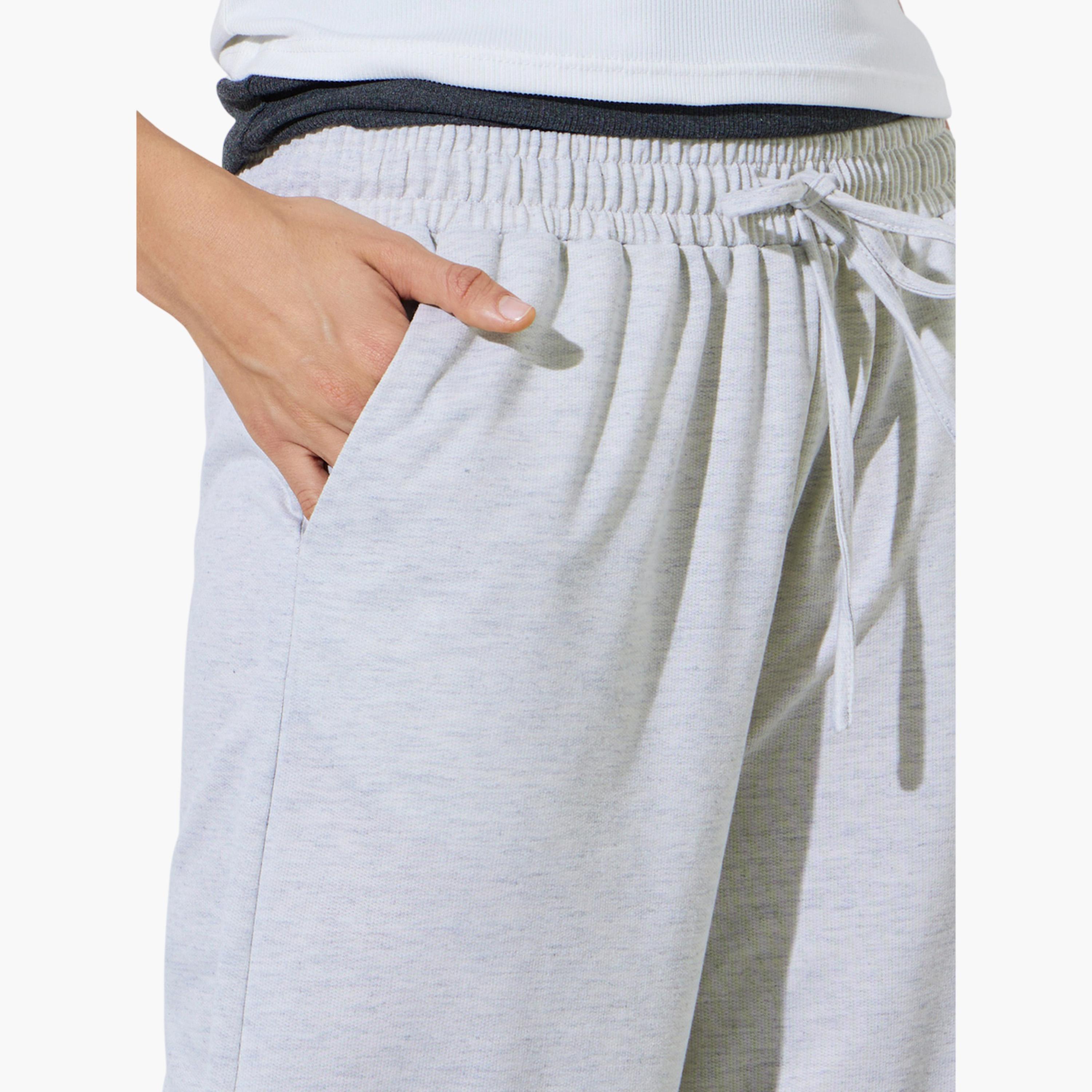 ستايلي - بنطال رياضي واسع الساقين بلون متين مع جيب-women-clothing-bottoms-joggers-image-3