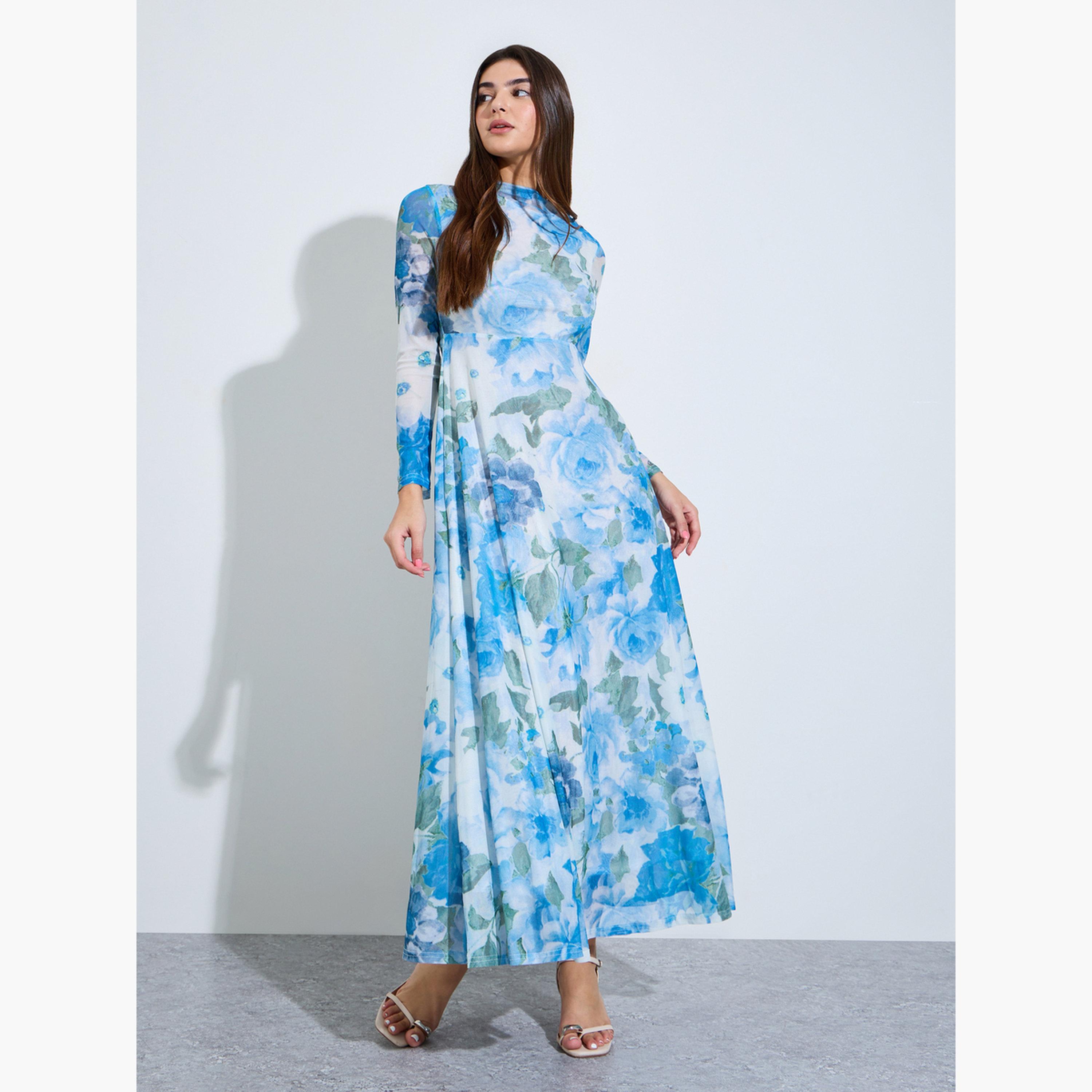 فستان طويل بحافة واسعة وأكمام طويلة وطبعة زهور-women-clothing-dresses-image-1