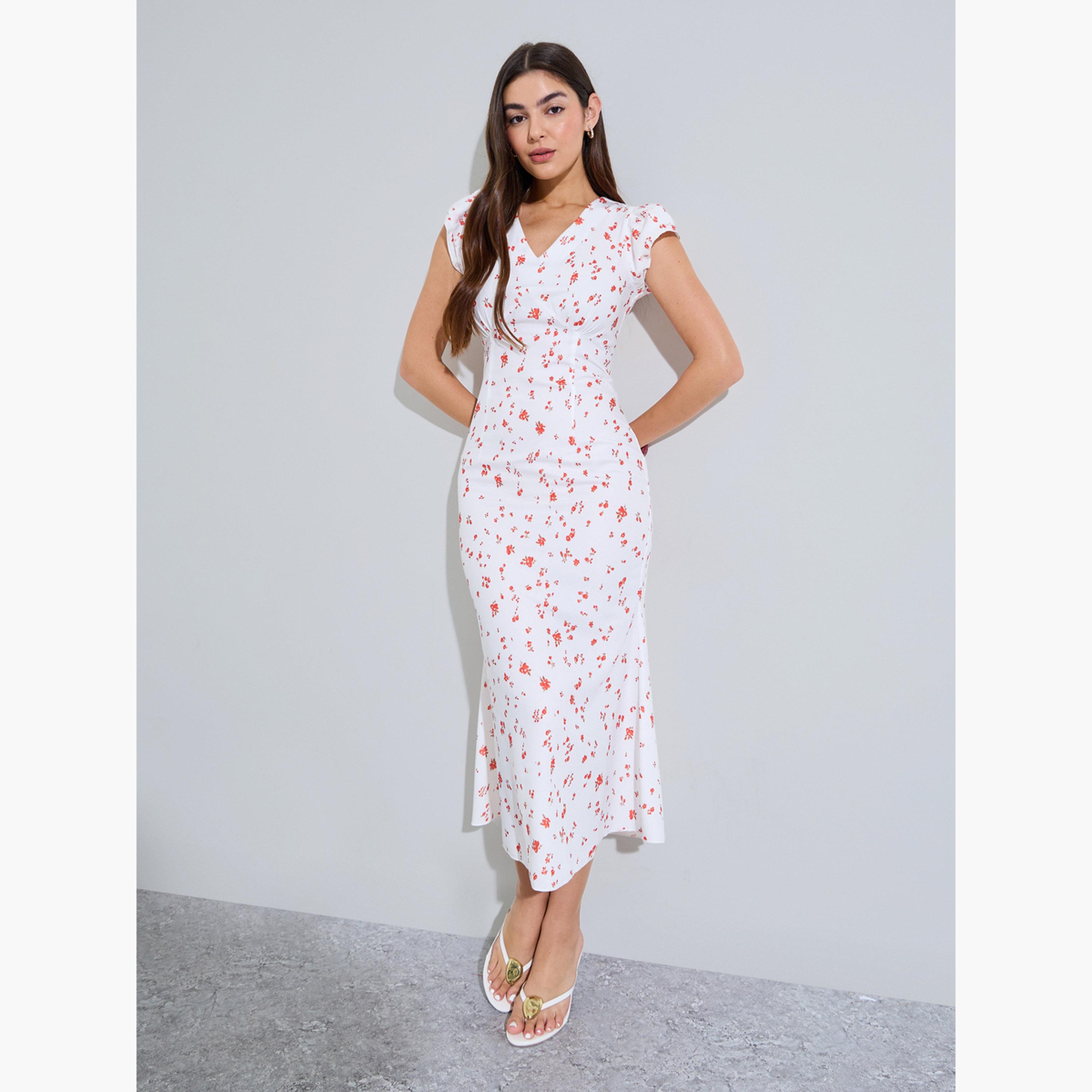 ستايلي - فستان ميدي واسع بدون أكمام بطبعة زهور بيضاء-women-clothing-dresses-image-1