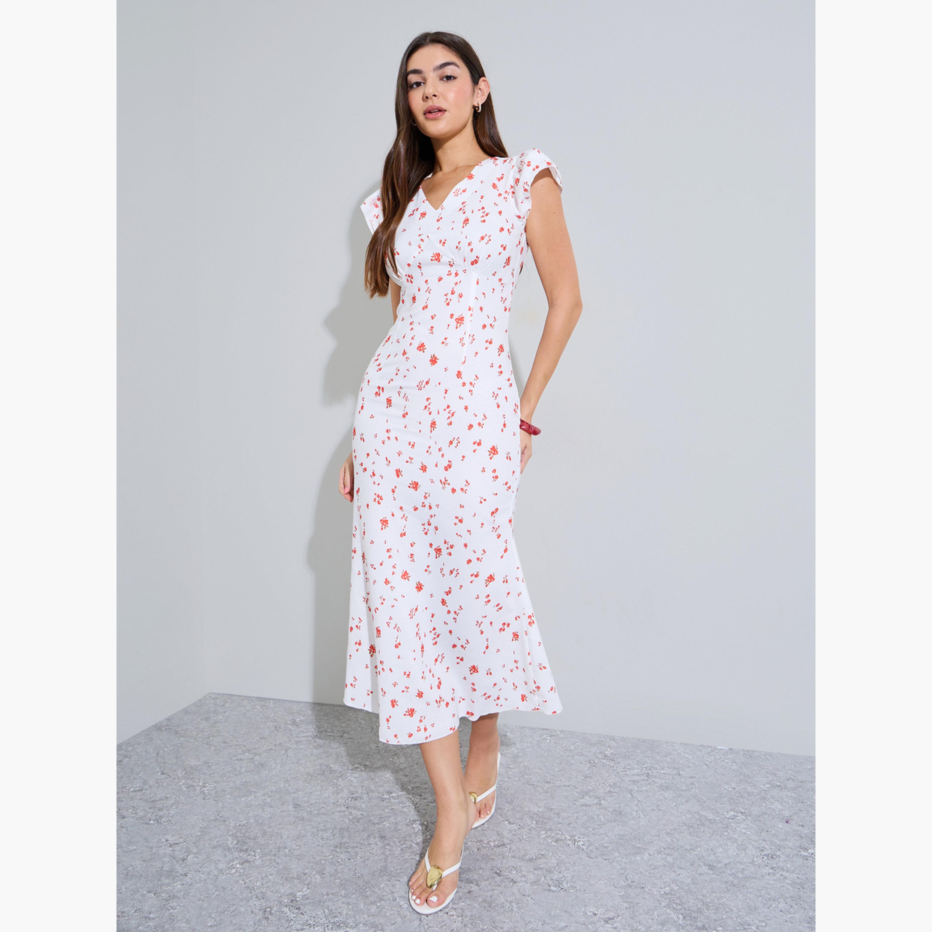 ستايلي - فستان ميدي واسع بدون أكمام بطبعة زهور بيضاء-women-clothing-dresses-image-3