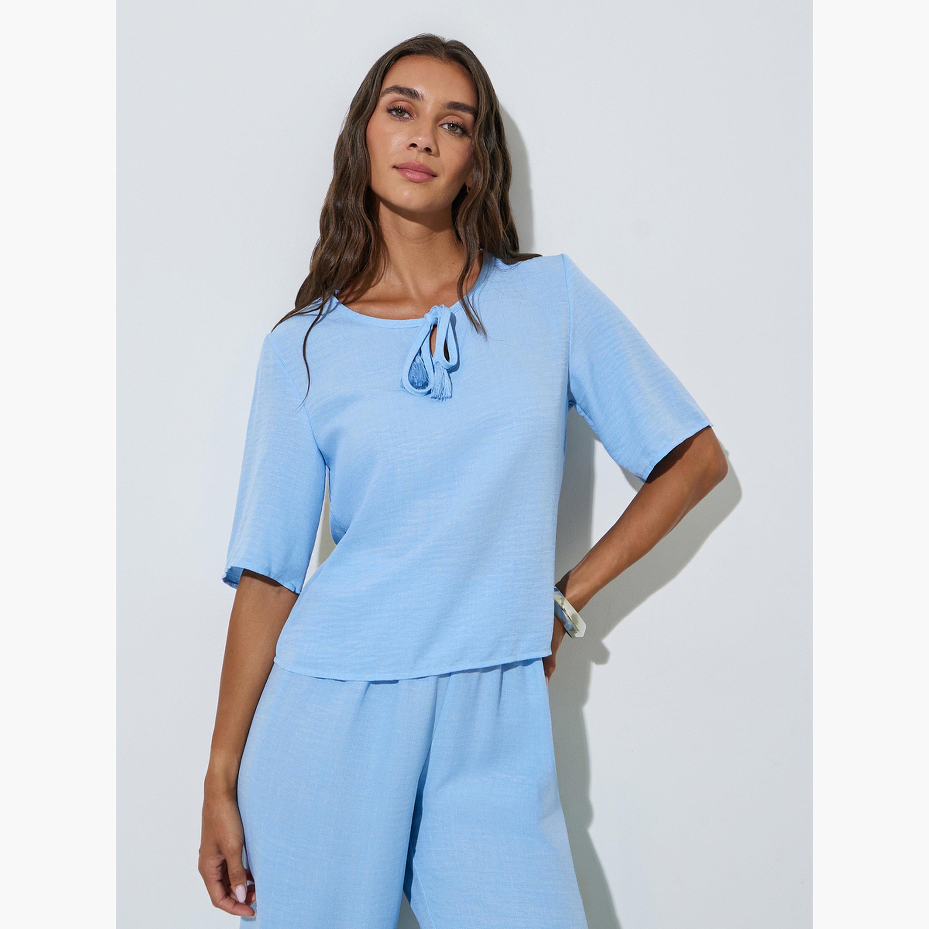 طقم منسق من بنطال بأرجل واسعة وبلوزة برباط عنق بلون سادة لون أزرق-women-clothing-coordsets-image-3
