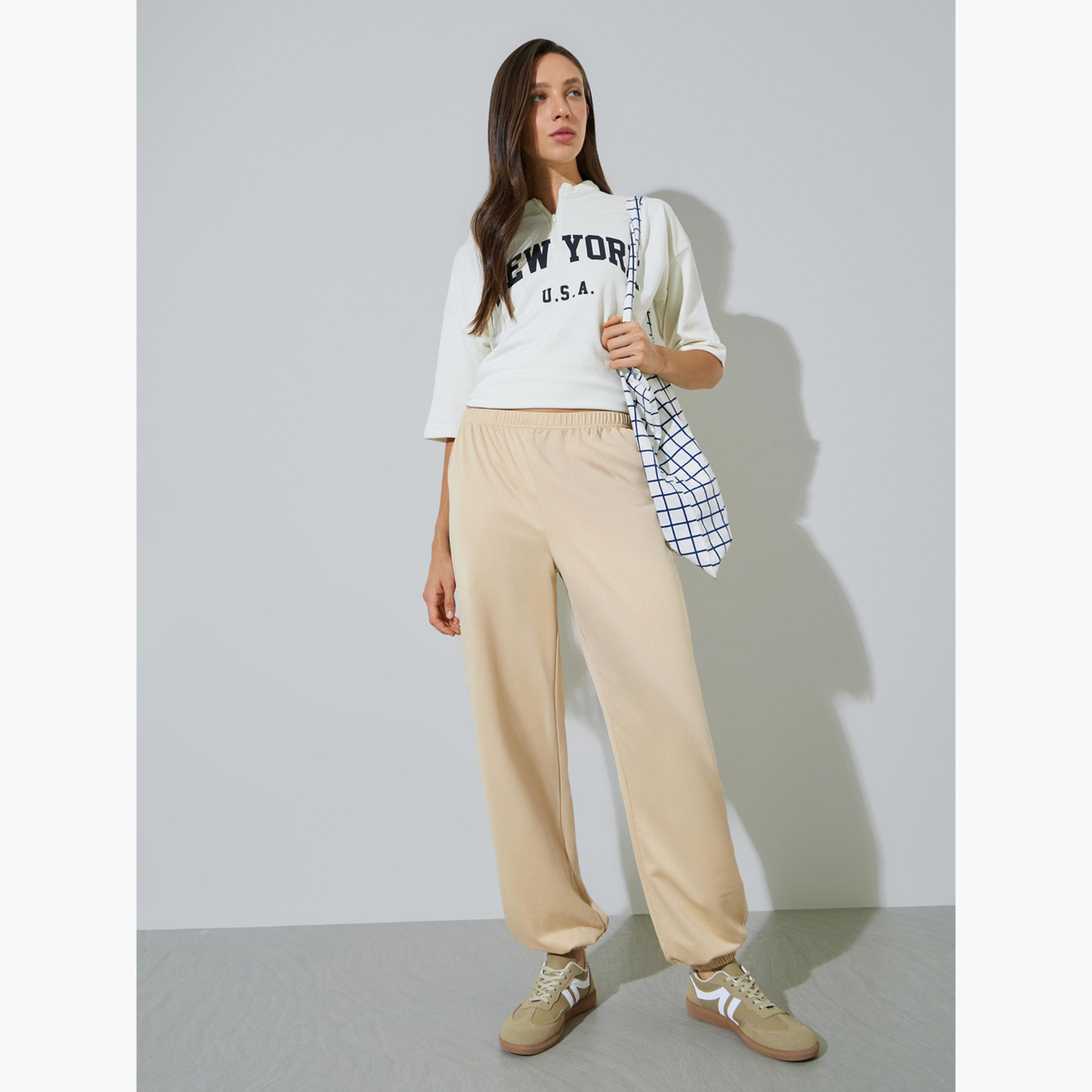 ستايلي - بنطال رياضي بيج سادة بخصر مطاطي وأساور مطاطية-women-clothing-bottoms-joggers-image-2