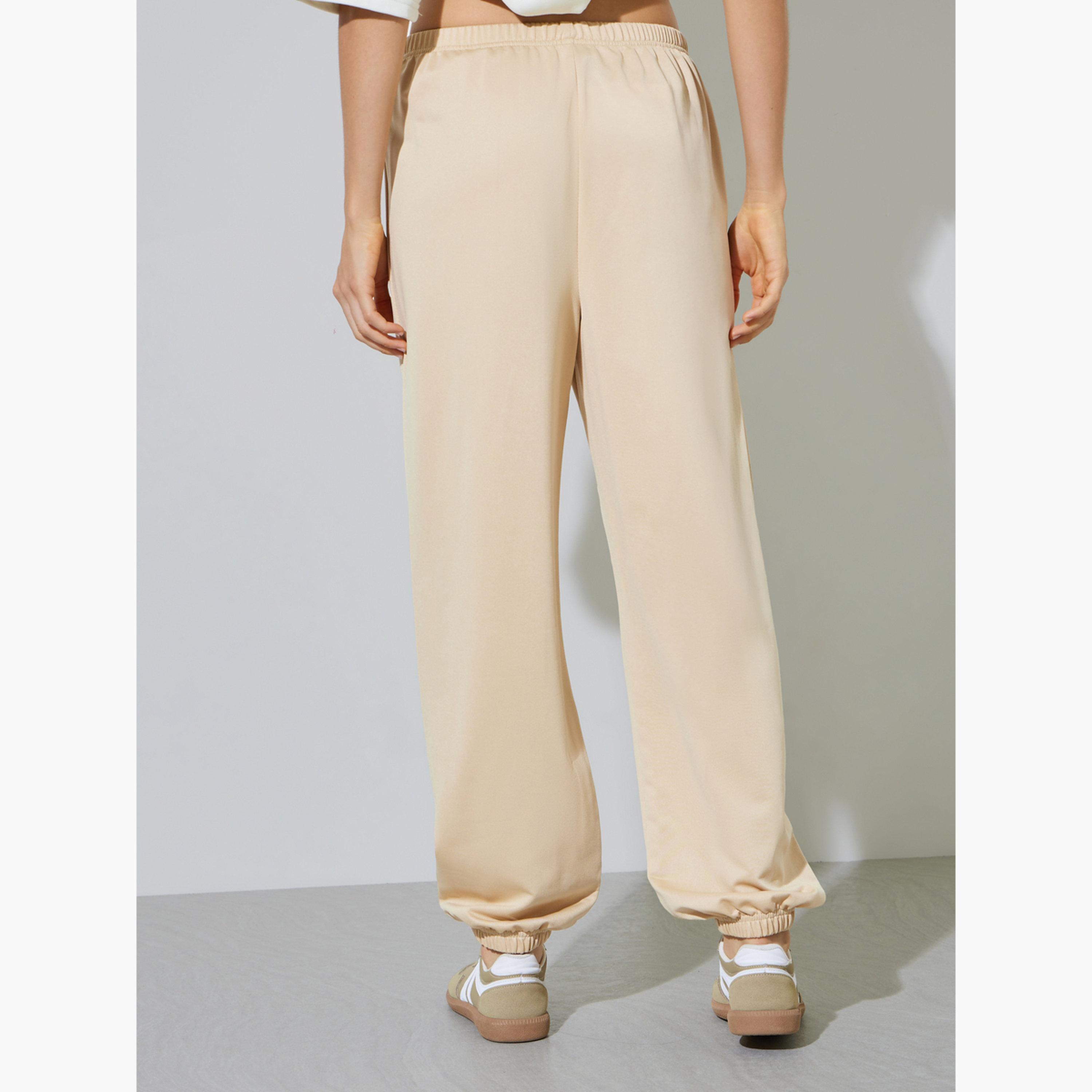 ستايلي - بنطال رياضي بيج سادة بخصر مطاطي وأساور مطاطية-women-clothing-bottoms-joggers-image-3