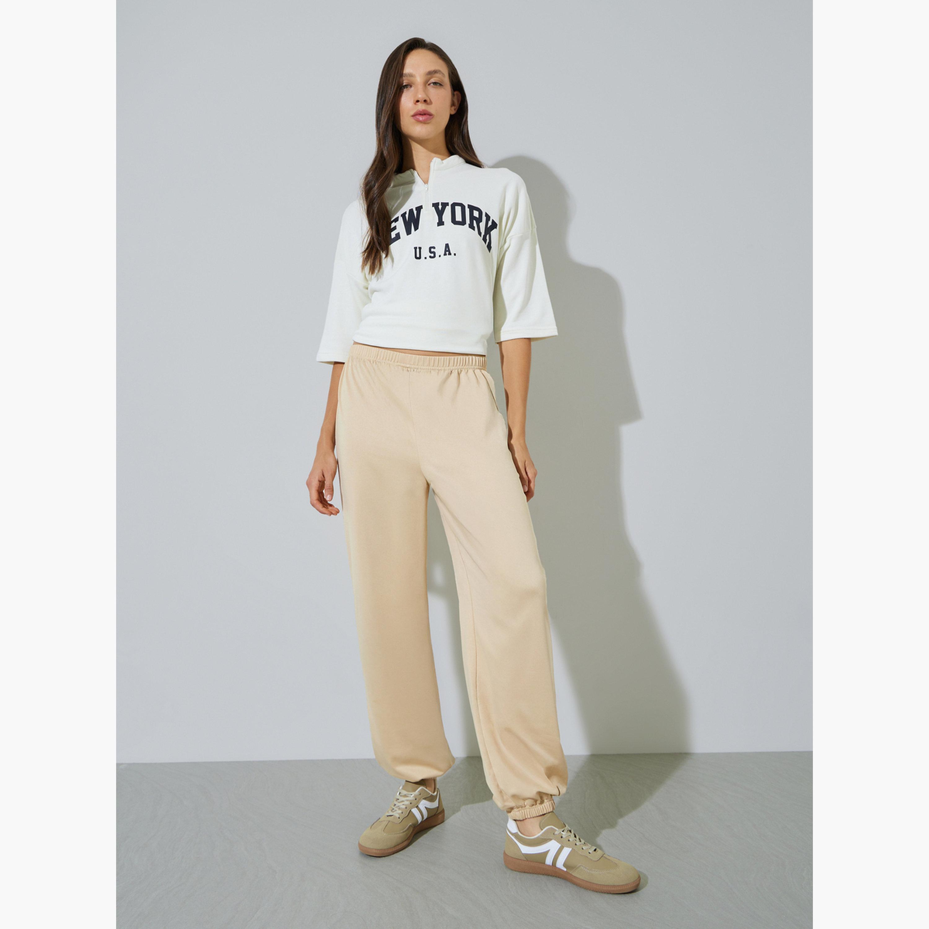 ستايلي - بنطال رياضي بيج سادة بخصر مطاطي وأساور مطاطية-women-clothing-bottoms-joggers-image-5
