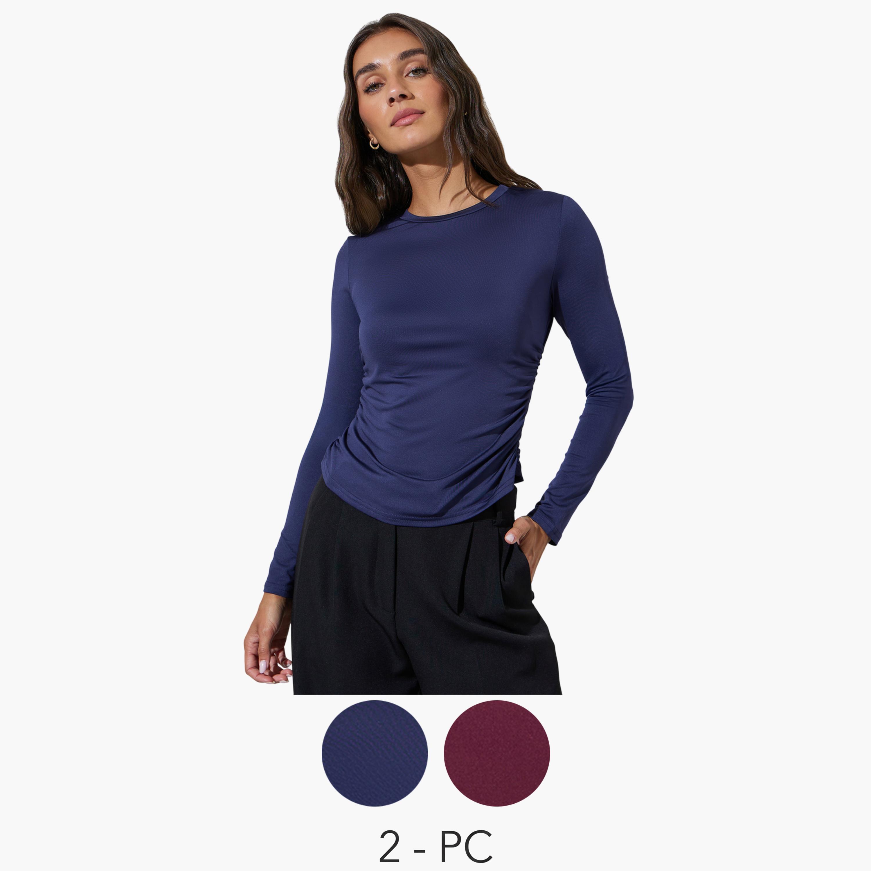 طقم من قطعتين بلوزة محبوكة أكمام طويلة بياقة دائرية وتفاصيل زمزمات وقصة ضيقة-women-clothing-shirtsandblouses-blouses-image-1
