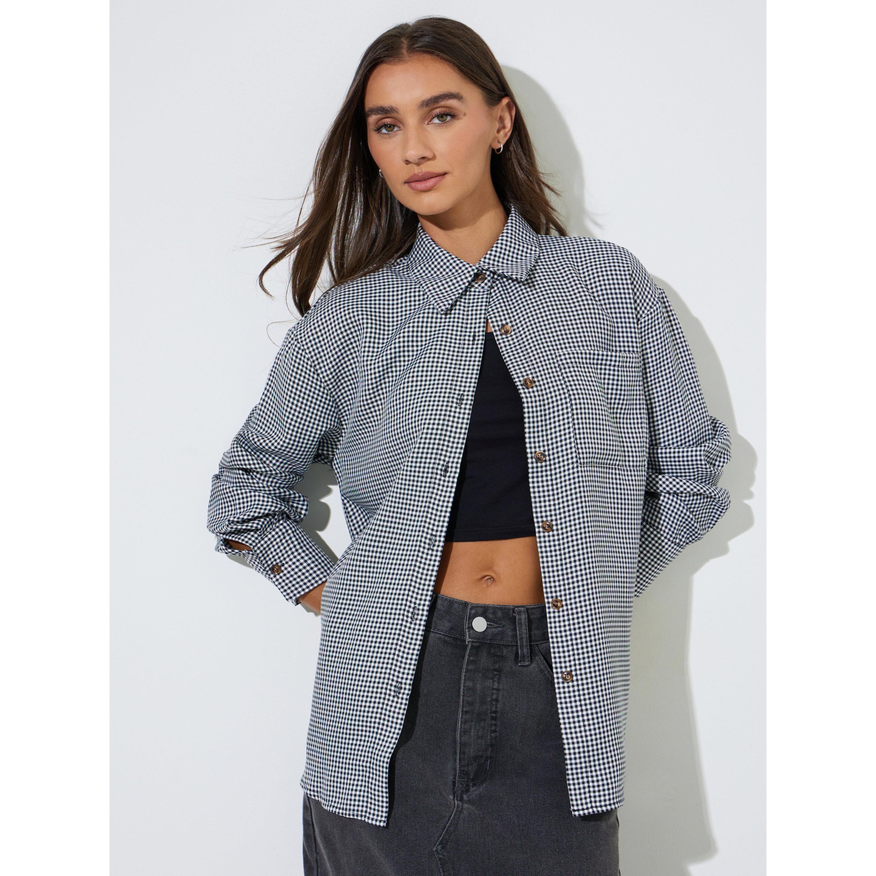 بلوزة واسعة بأكمام طويلة وتفاصيل جيوب ونقش كروهات باللون الأسود-women-clothing-shirtsandblouses-shirts-image-4