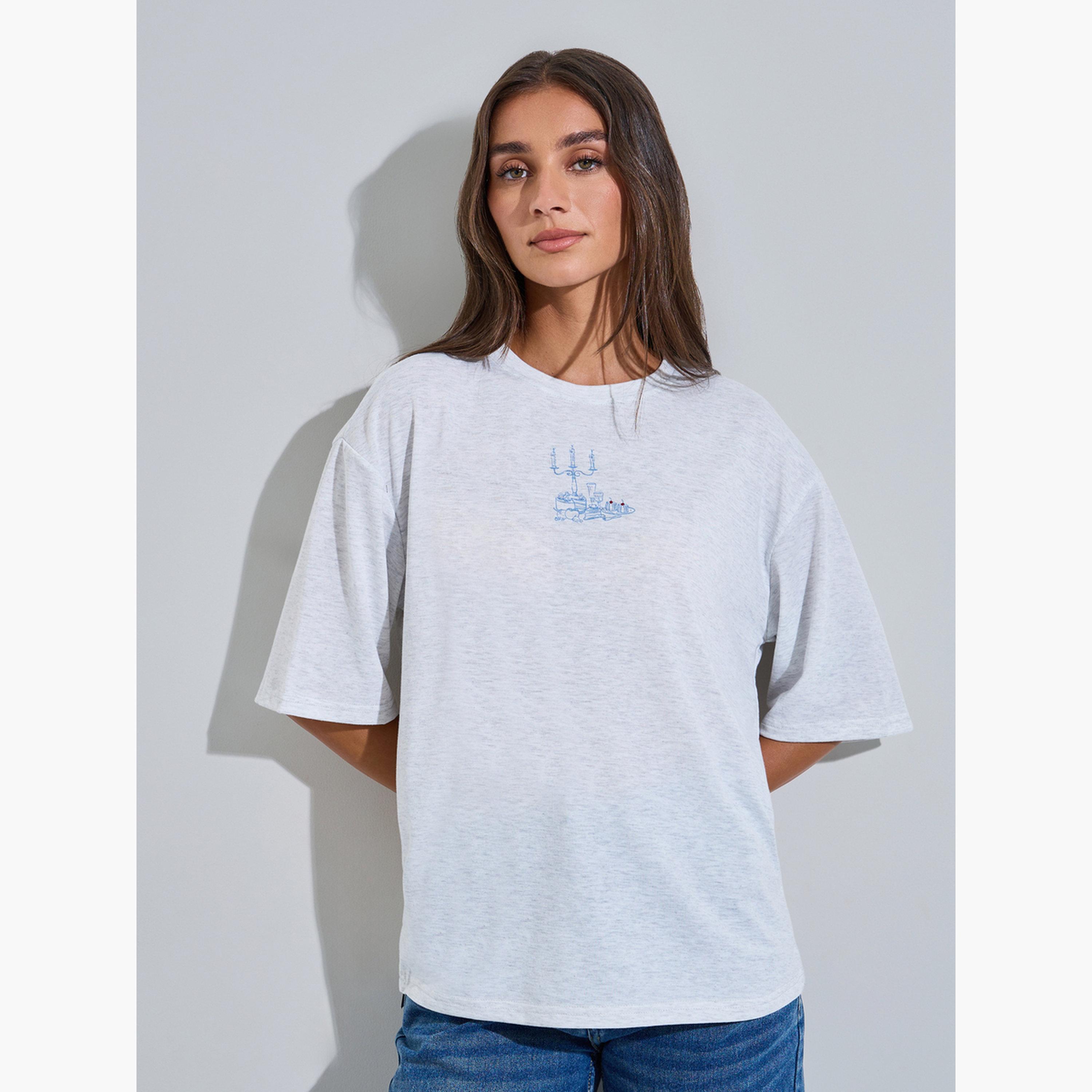 تيشيرت واسع بأكمام قصيرة وطبعة جرافيك لون رمادي-women-clothing-tshirts-image-1