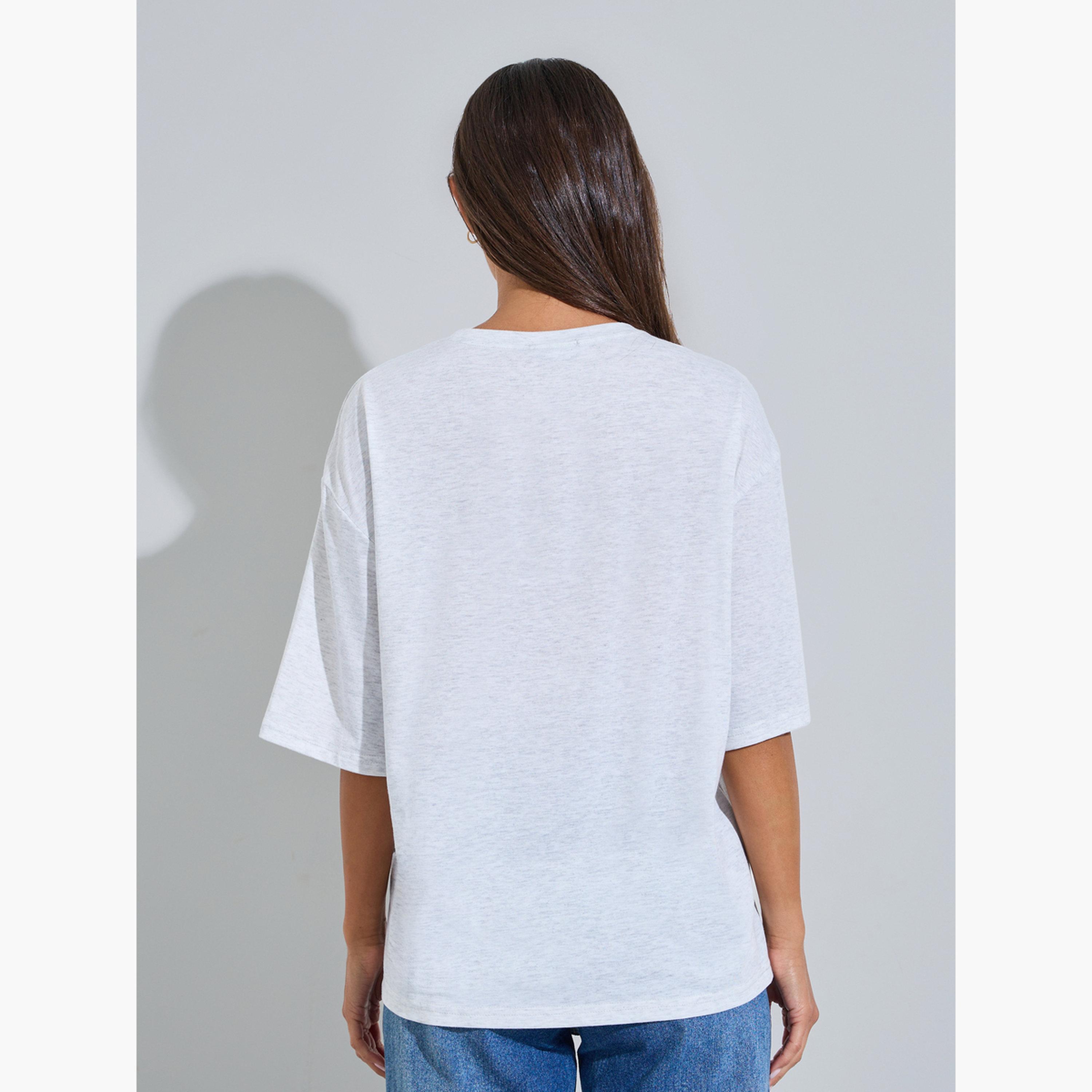 تيشيرت واسع بأكمام قصيرة وطبعة جرافيك لون رمادي-women-clothing-tshirts-image-4
