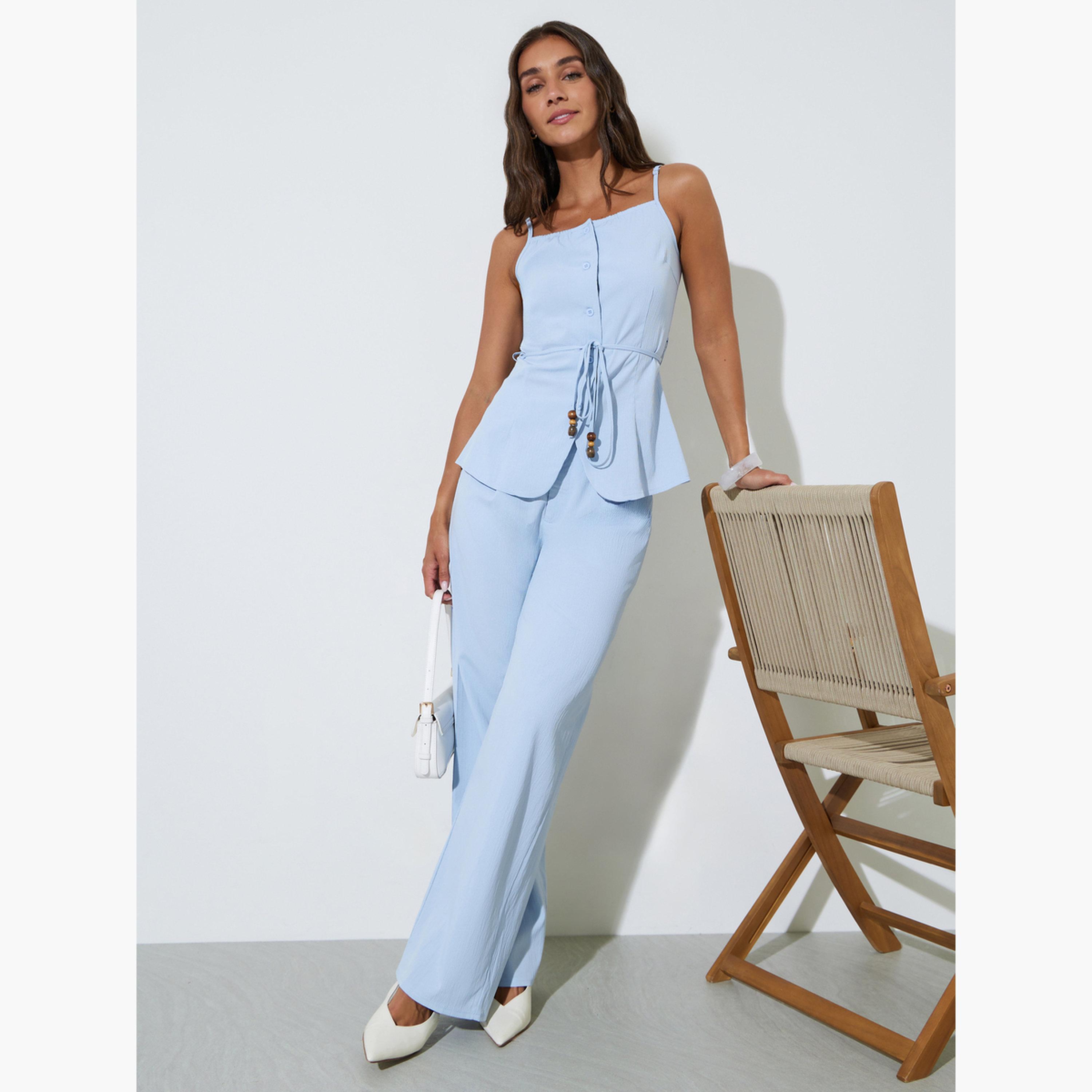 طقم منسق من بنطال بأرجل واسعة وبلوزة بحمالات ورباط خصر بلون سادة لون أزرق-women-clothing-coordsets-image-3