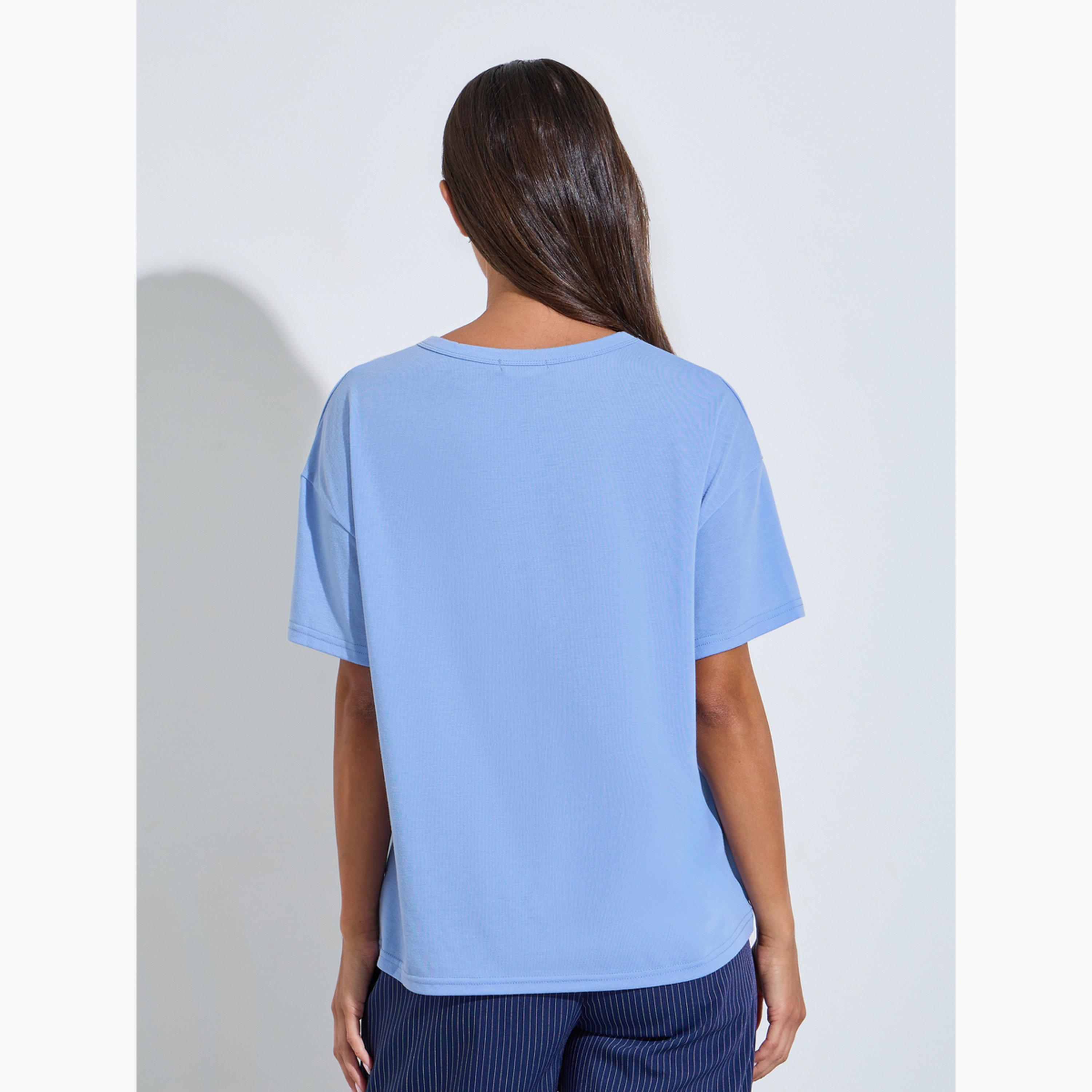 تيشيرت واسع بأكمام قصيرة وطبعة جرافيك أرنب لون أزرق-women-clothing-tshirts-image-4