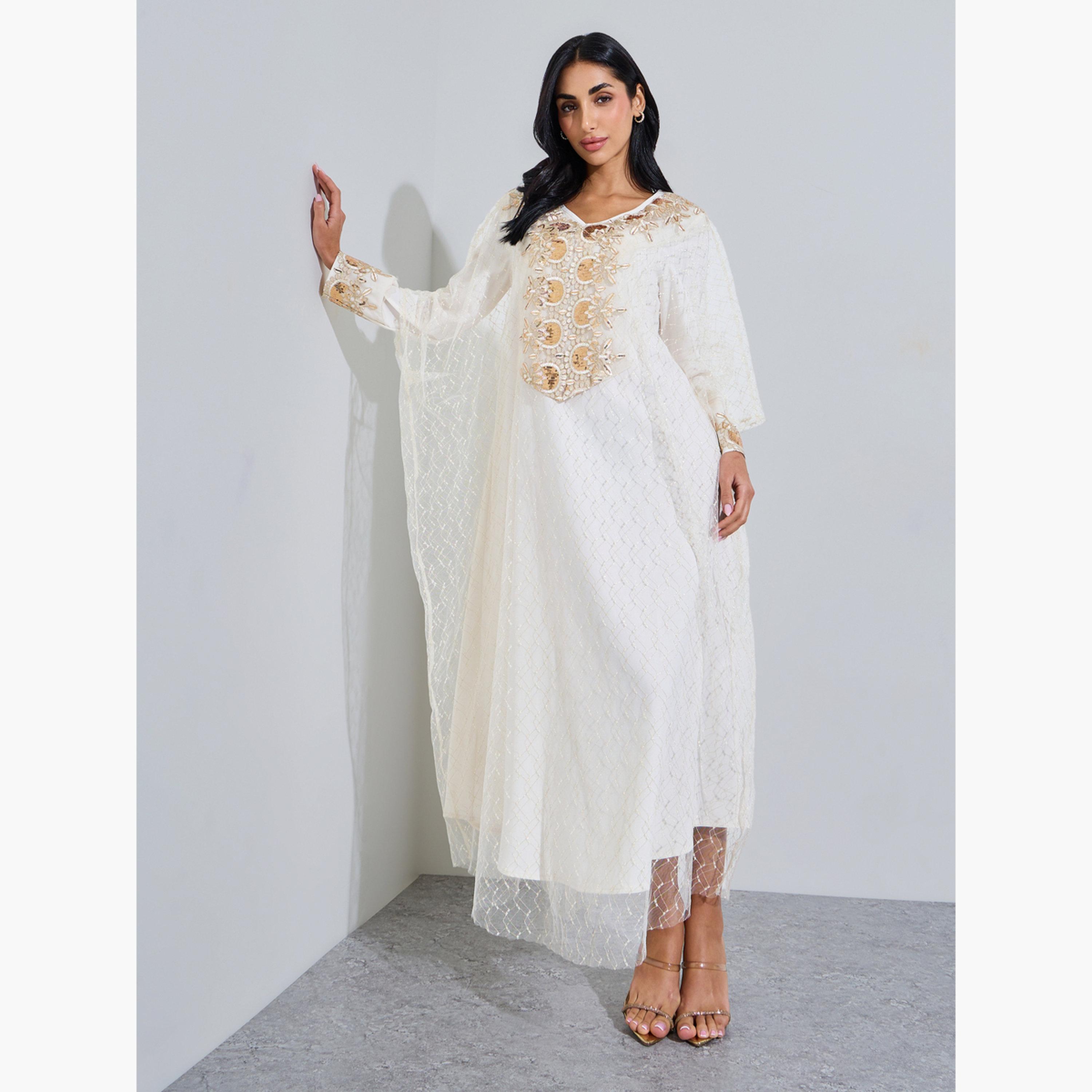 ستايلي - جلابية كريمية اللون مزينة بترتر شبكي-women-arabicclothing-jalabiyas-image-1