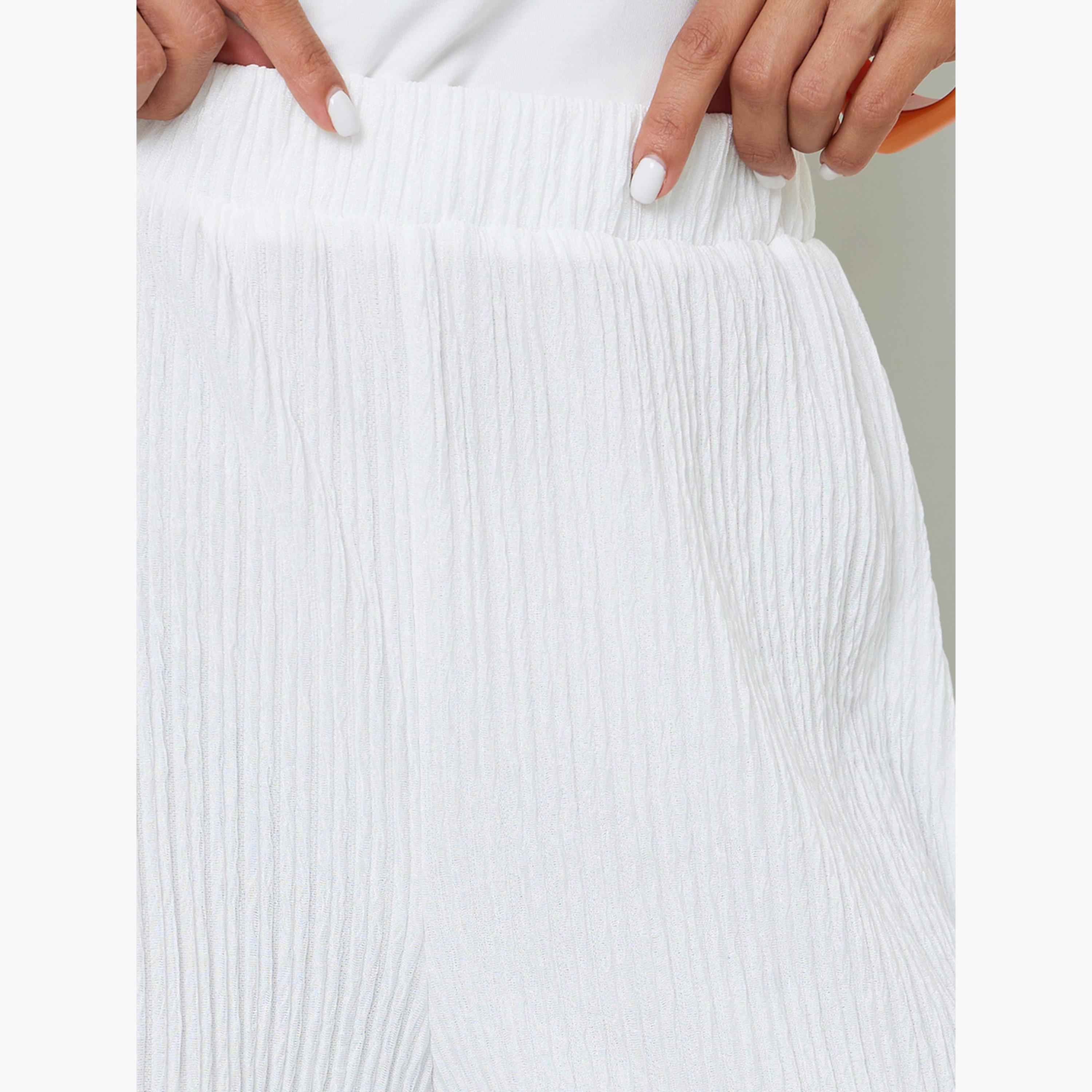بنطال بتفاصيل بارزة الملمس وأرجل واسعة باللون الأبيض-women-clothing-joggers-image-3