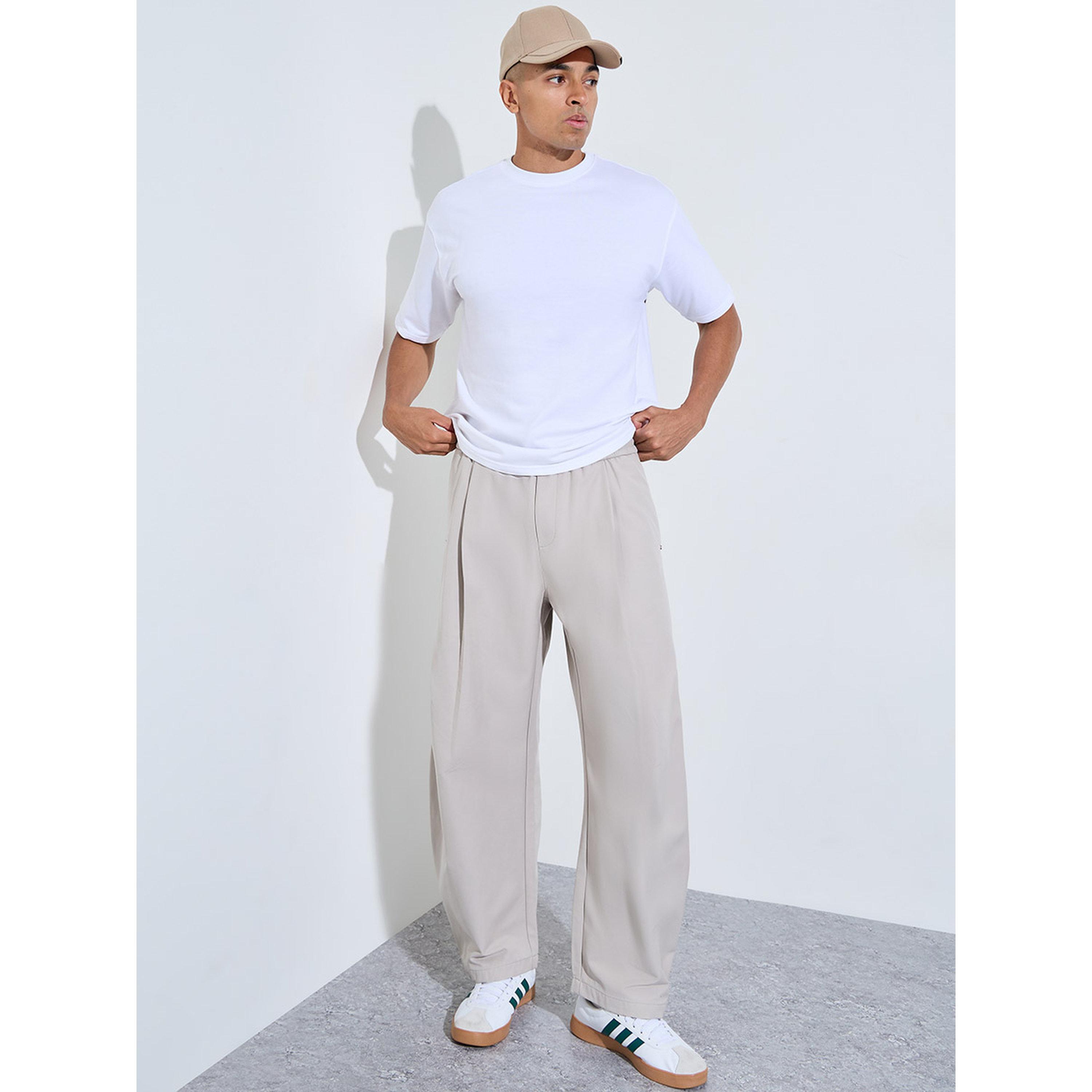 جوغر بأرجل واسعة وتفاصيل جيوب بلون سادة-men-clothing-joggers-image-2