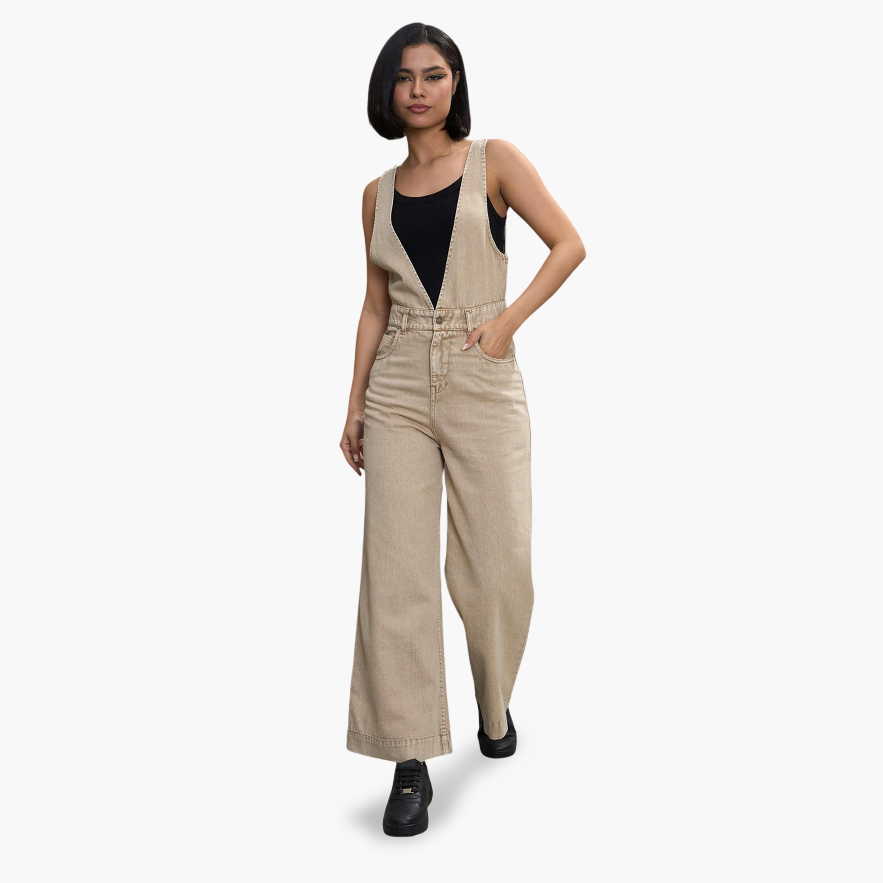 جمبسوت دنيم بأرجل واسعة باللون البيج-women-clothing-jumpsuits-image-1