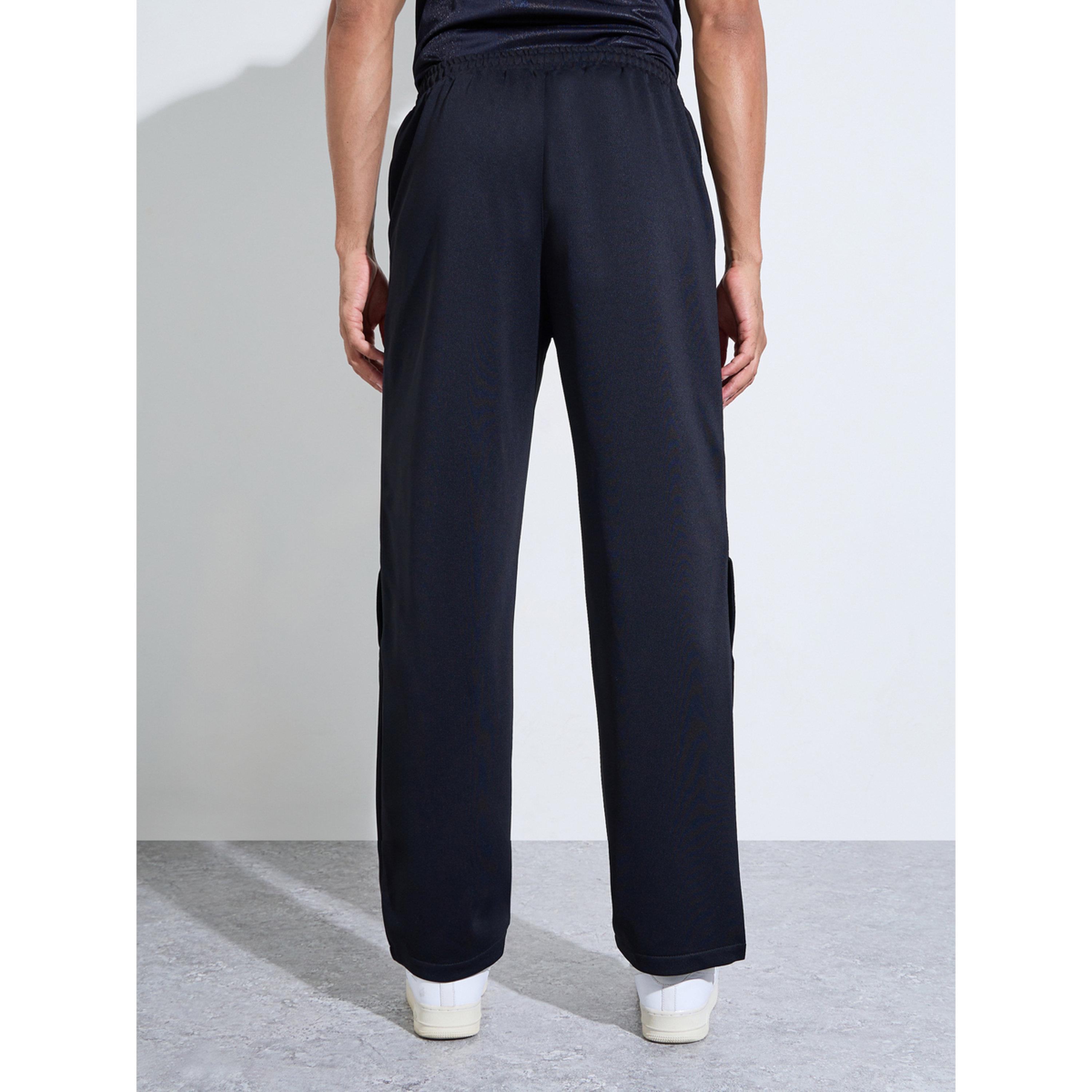 تيك تو - بنطال رجالي أسود سادة قماش محبوك برباط وحافة بأزرار-men-clothing-joggers-image-6