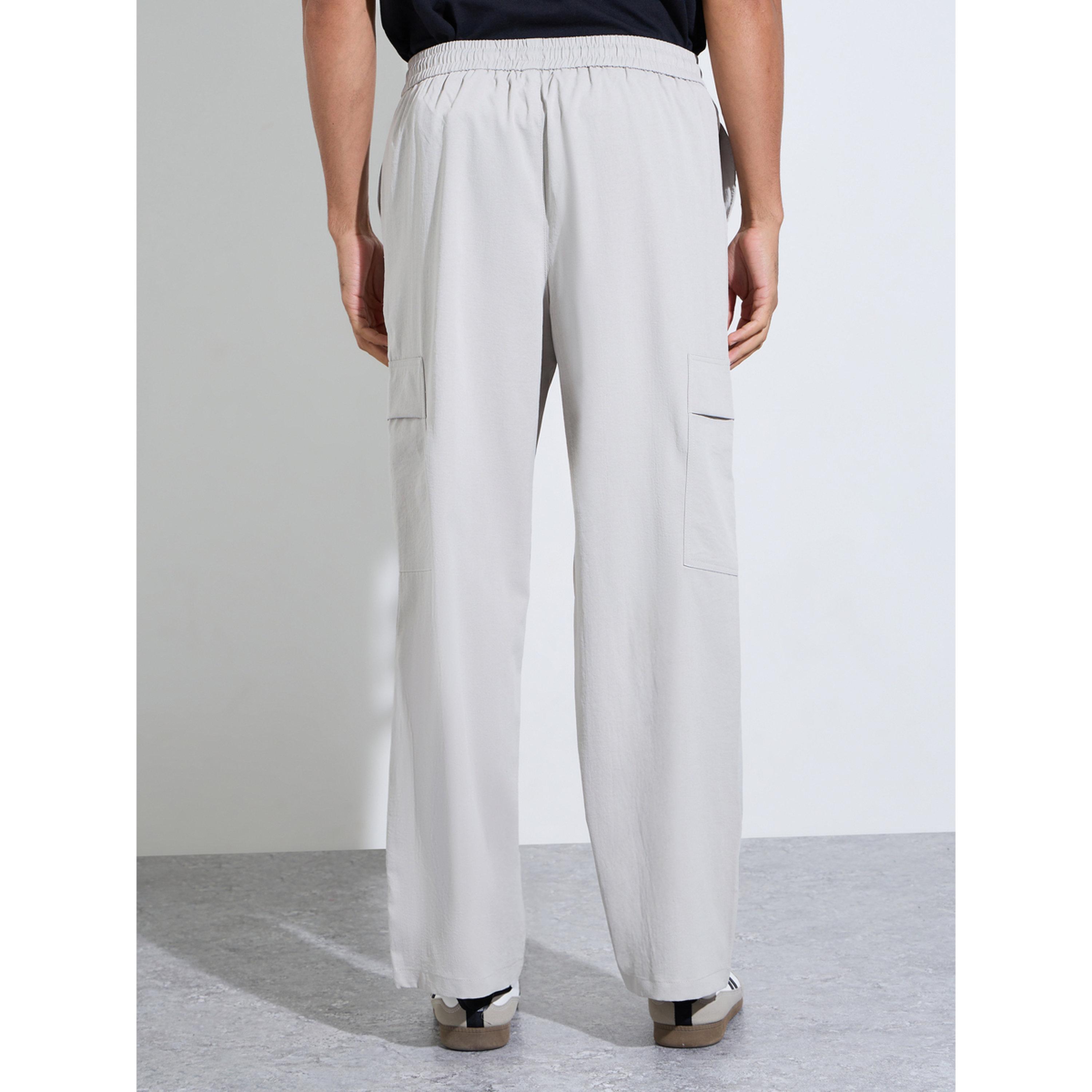 تيك تو - بنطال رجالي سادة بجيوب جانبية ورباط-men-clothing-joggers-image-4