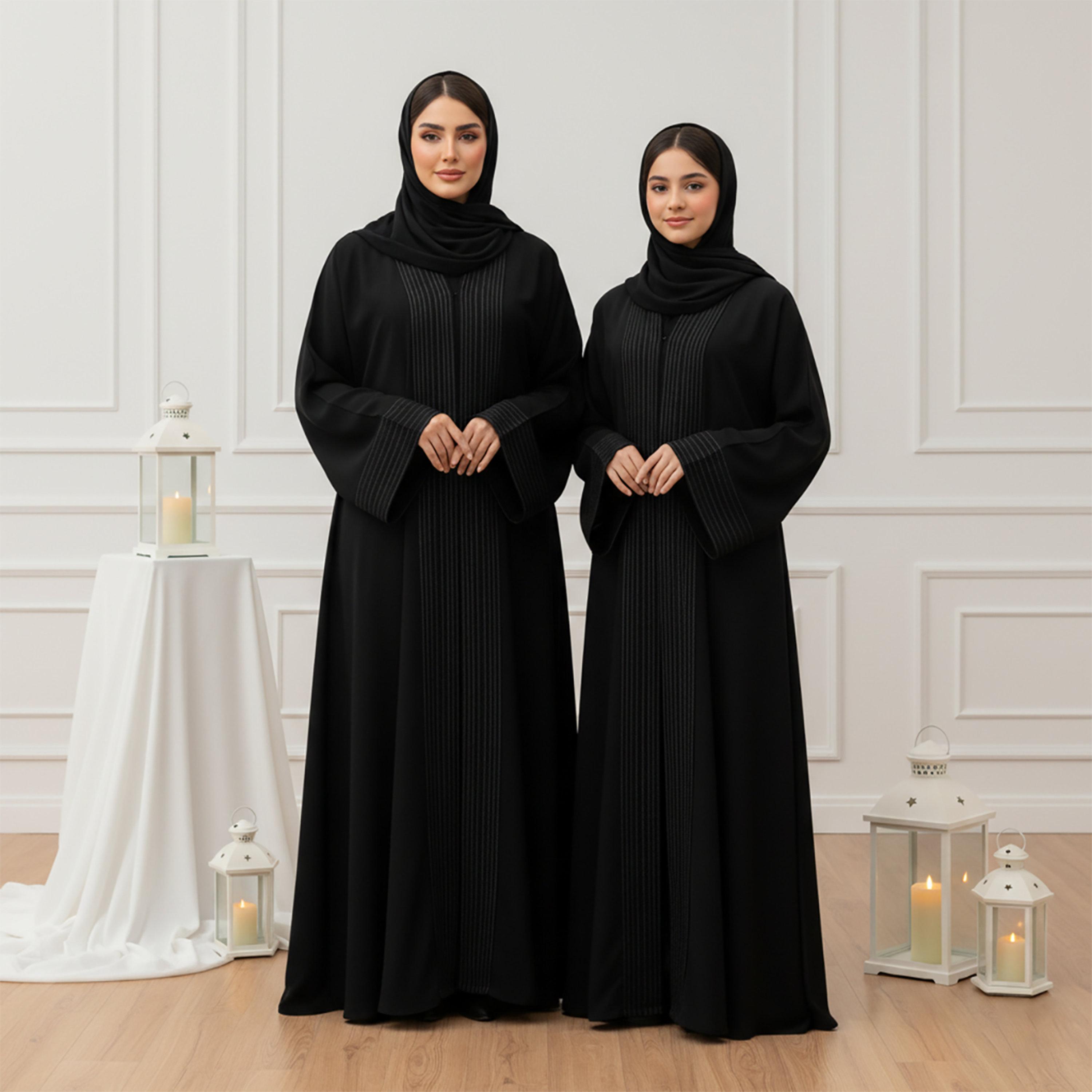 عباية نسائية قماش "ندى" بأكمام "وايد" وتفاصيل "ستيتش" مع حجاب - أسود من نخبة-women-arabicclothing-abayas-image-2
