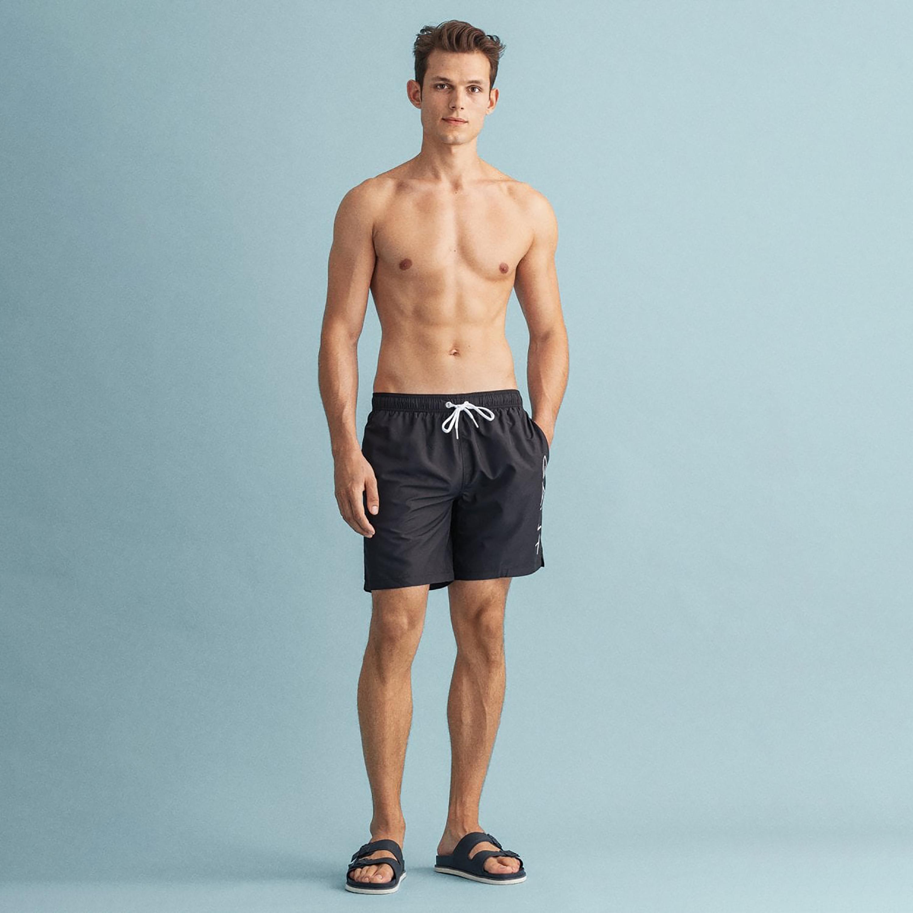 Buy Men s Gant Logo Print Low Rise Drawstring Swim Shorts Online Centrepoint UAE