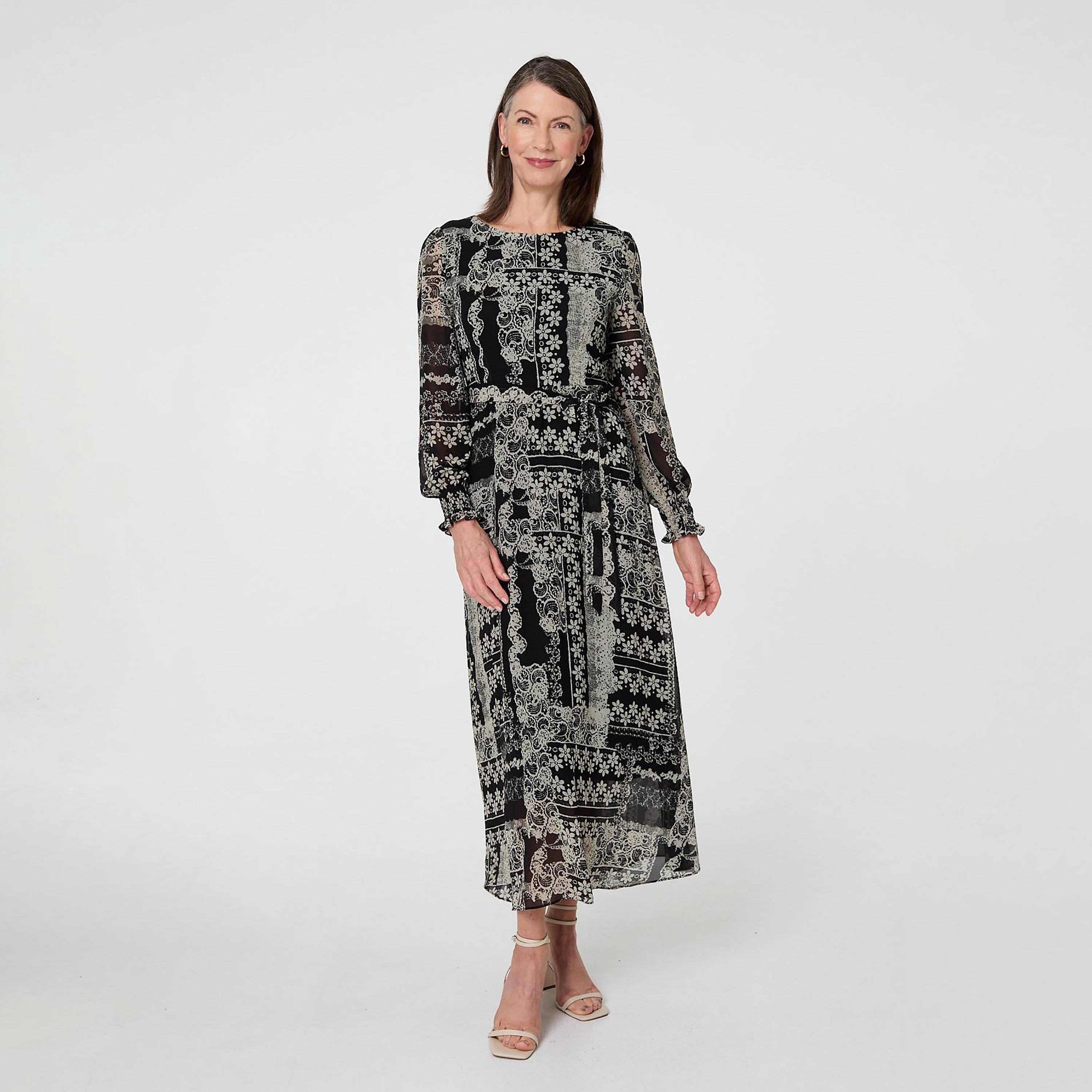 فستان ماكسي نسائي بأكمام "بيشوب" وطبعة زهور بلون أسود من إيزابيل لندن-women-clothing-dresses-image-1