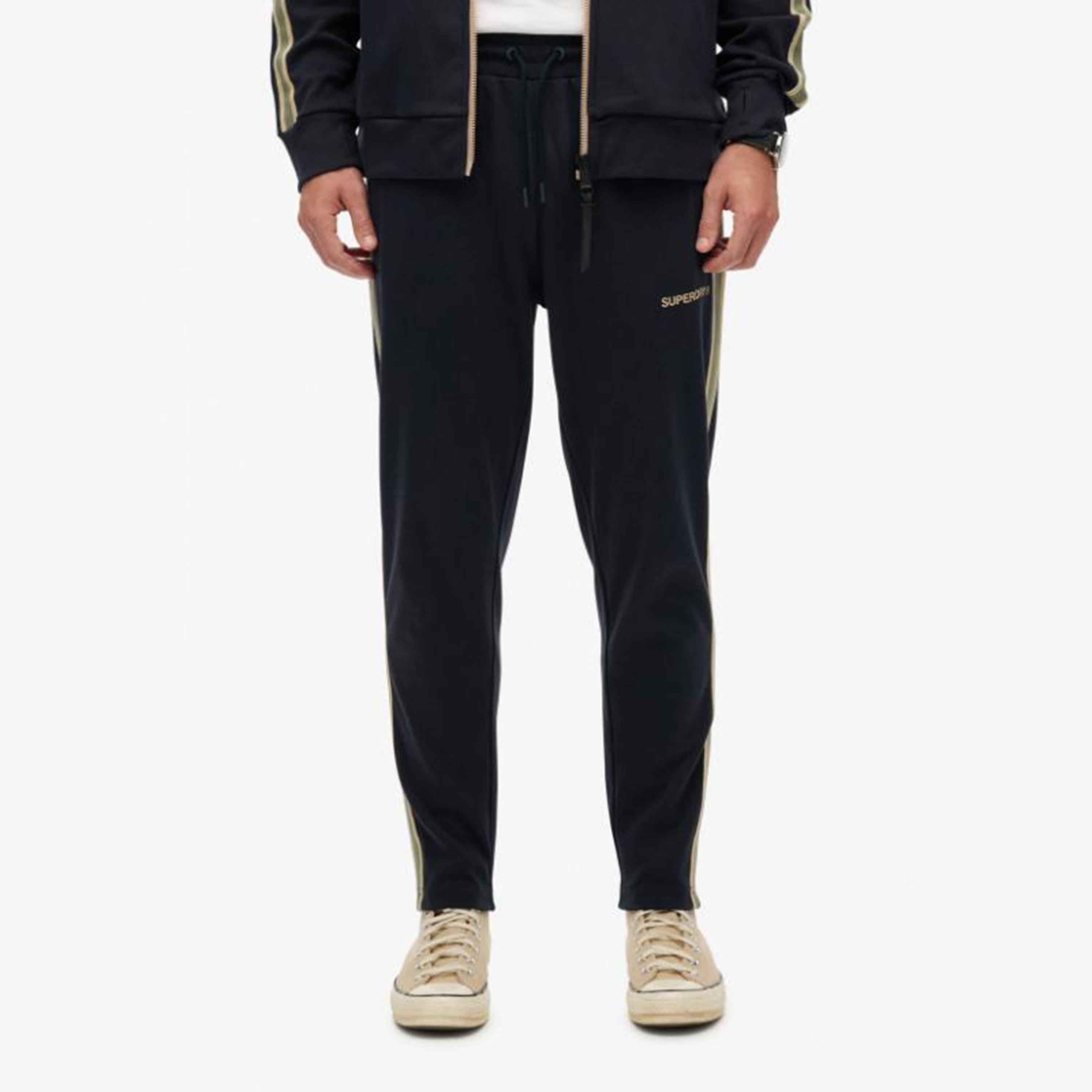 بنطلون رياضي رجالي بخصر متوسط وبرباط سحب وخطوط جانبية من سوبر دراي-men-clothing-bottoms-joggers-image-1