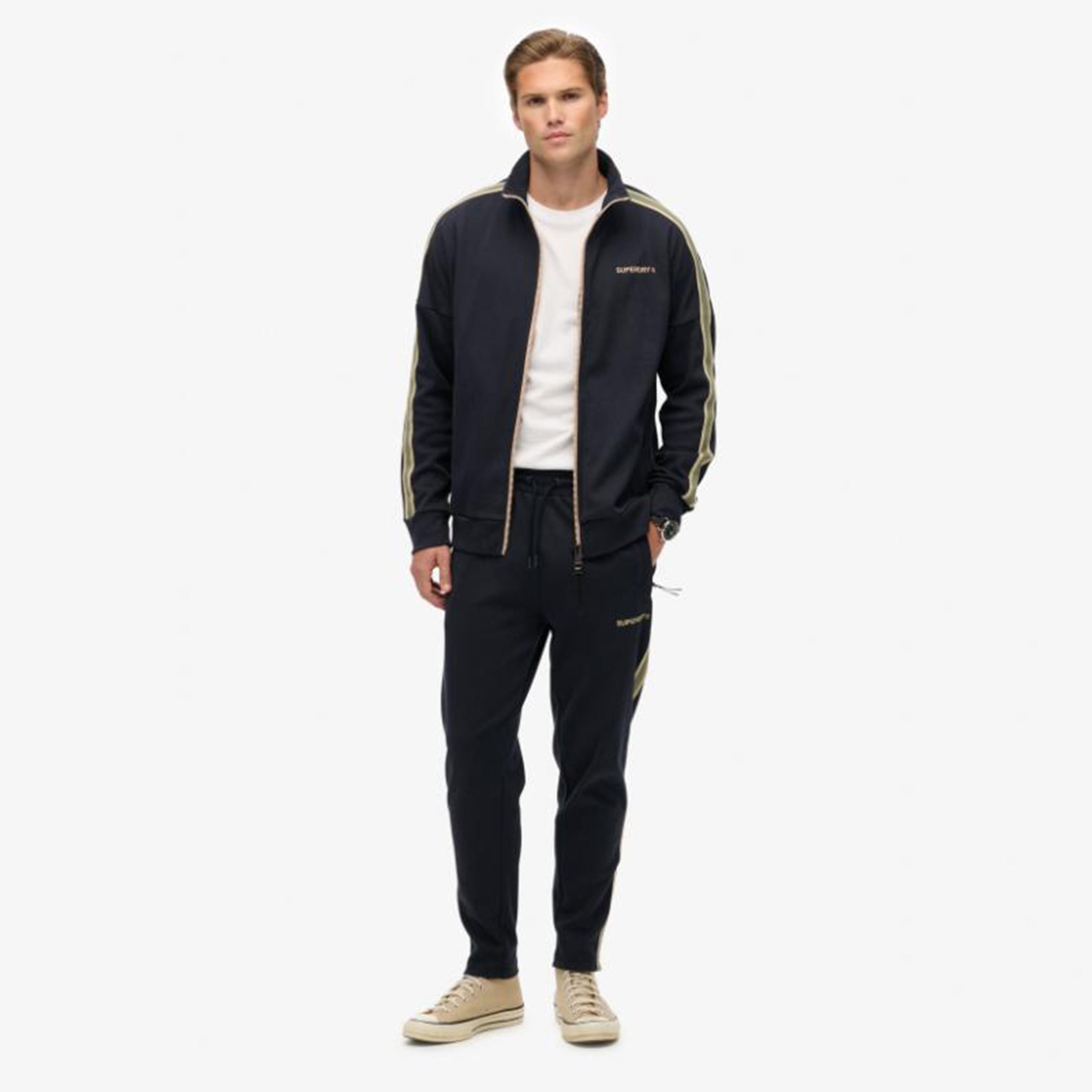 بنطلون رياضي رجالي بخصر متوسط وبرباط سحب وخطوط جانبية من سوبر دراي-men-clothing-bottoms-joggers-image-2