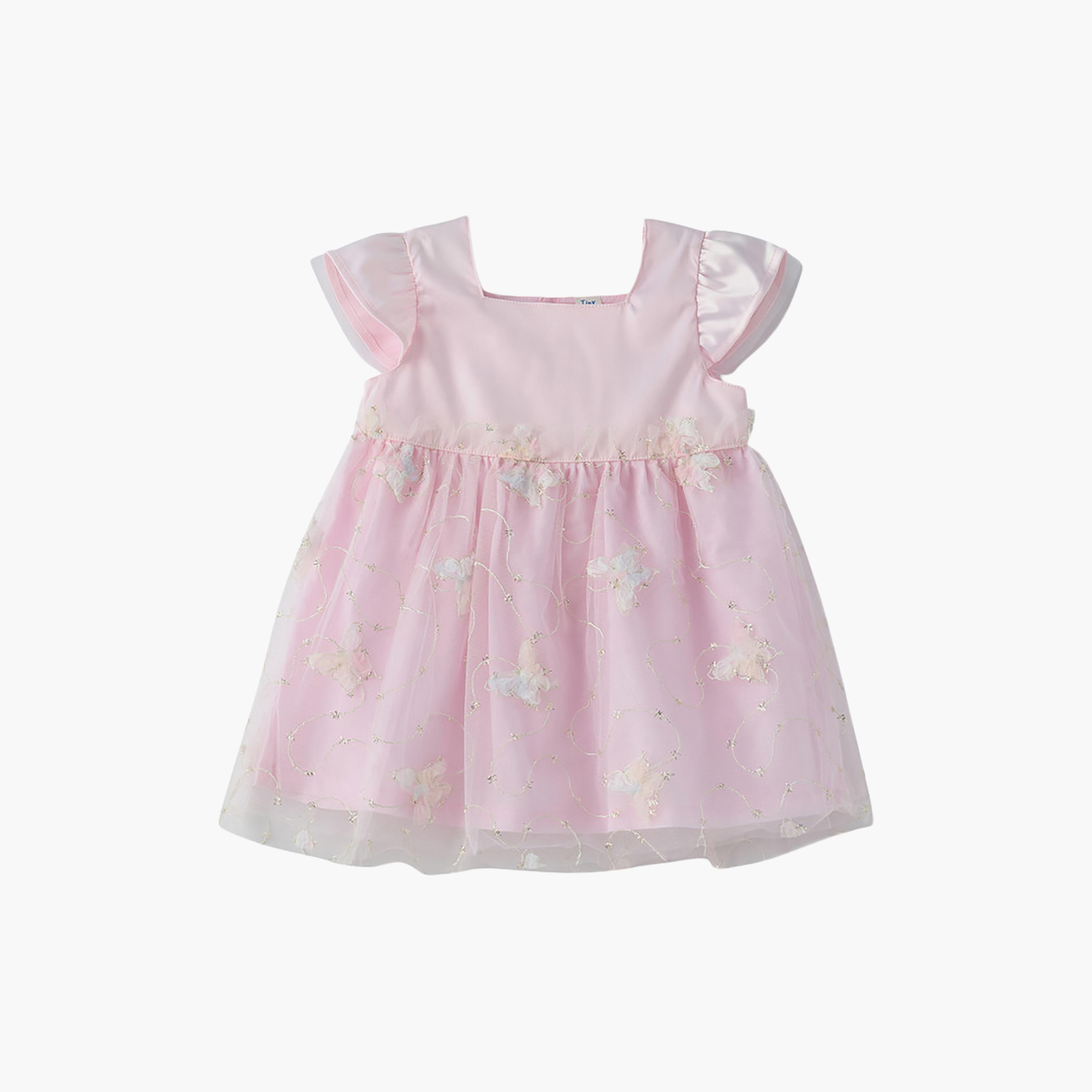 فستان قطن بنقشة زهور وأكمام قصيرة جداً (كاب) من يونيكيدز-baby-girls-clothing-dressesandjumpsuits-image-1