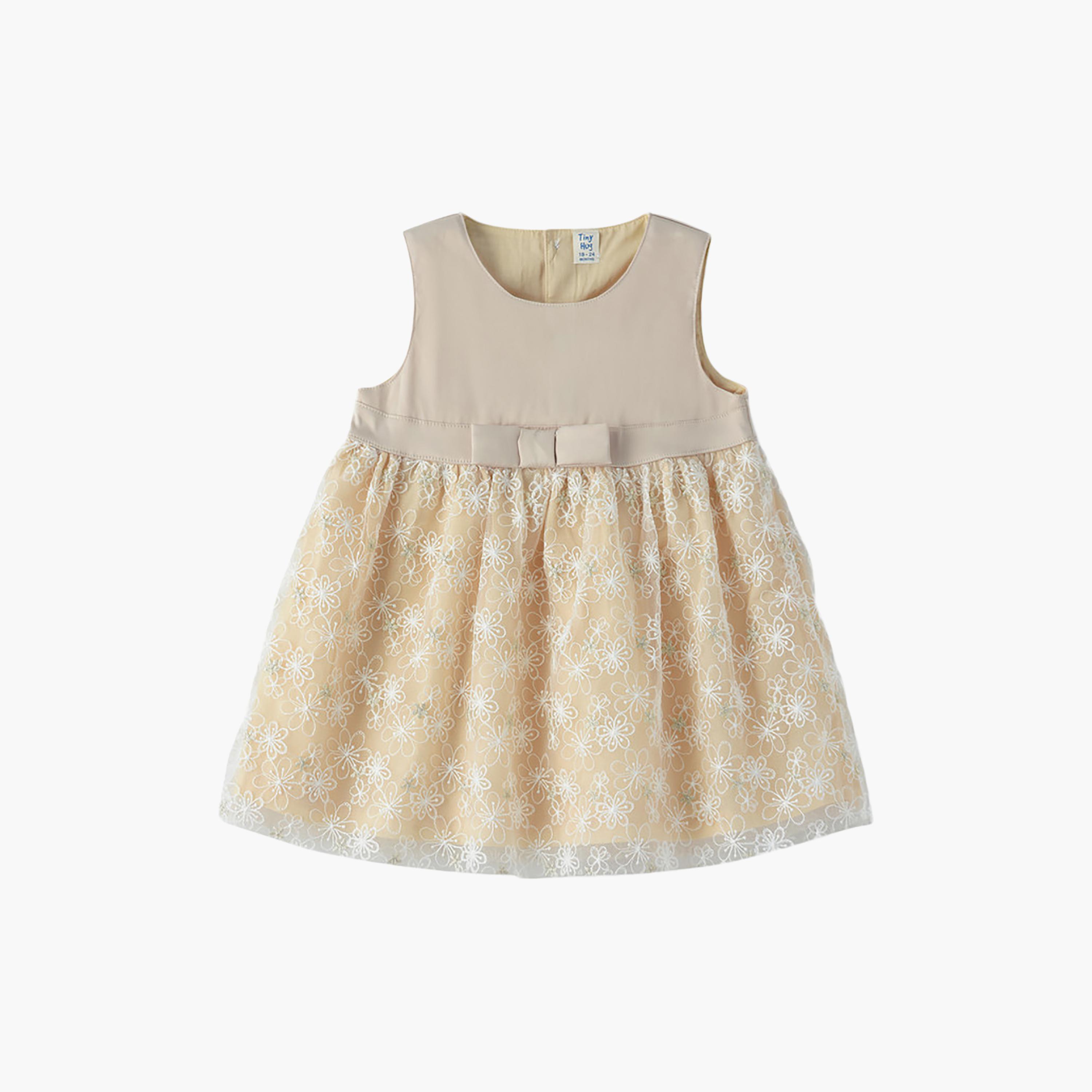 فستان قطن بدون أكمام بنقشة زهور من يونيكيدز-baby-girls-clothing-dressesandjumpsuits-image-1