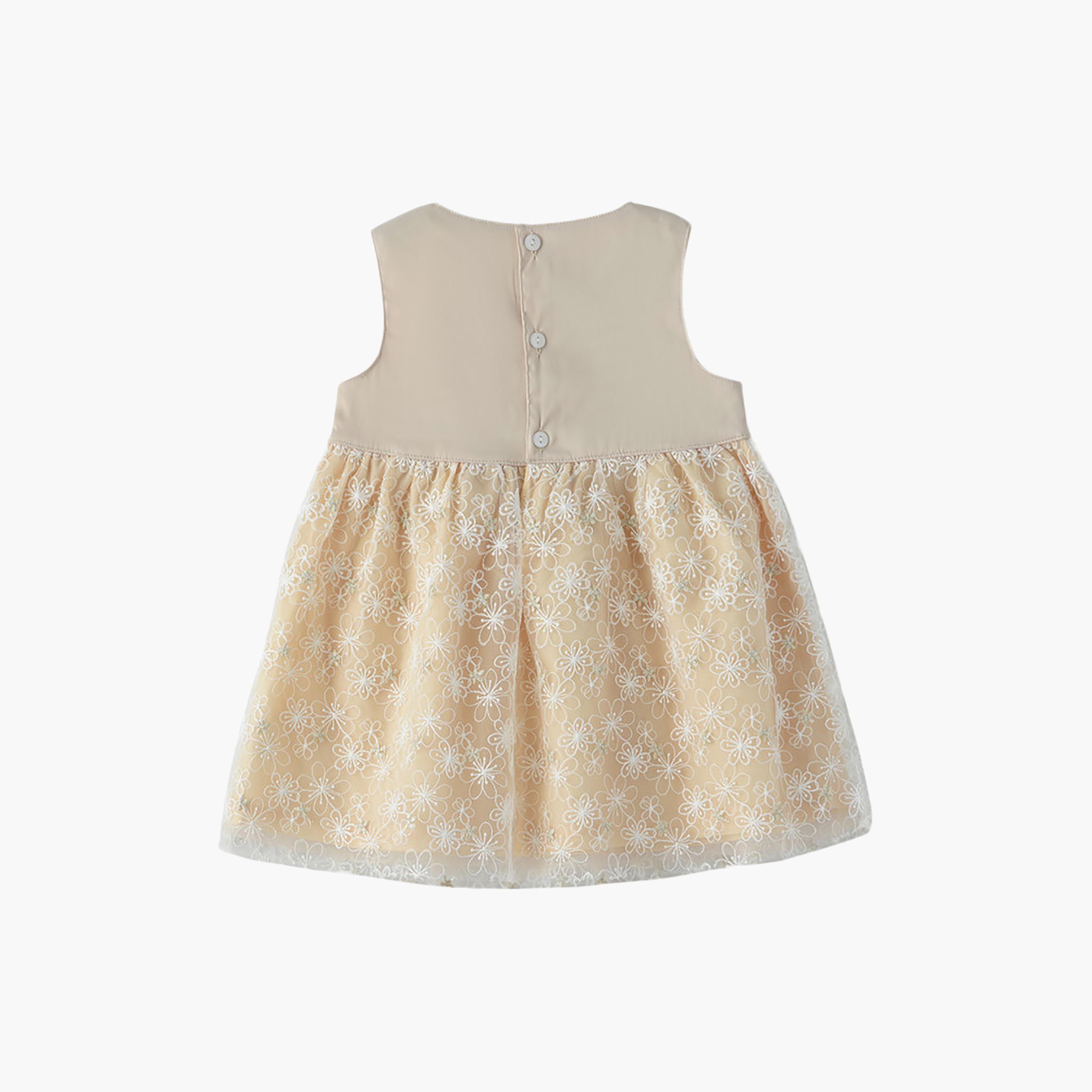 فستان قطن بدون أكمام بنقشة زهور من يونيكيدز-baby-girls-clothing-dressesandjumpsuits-image-2