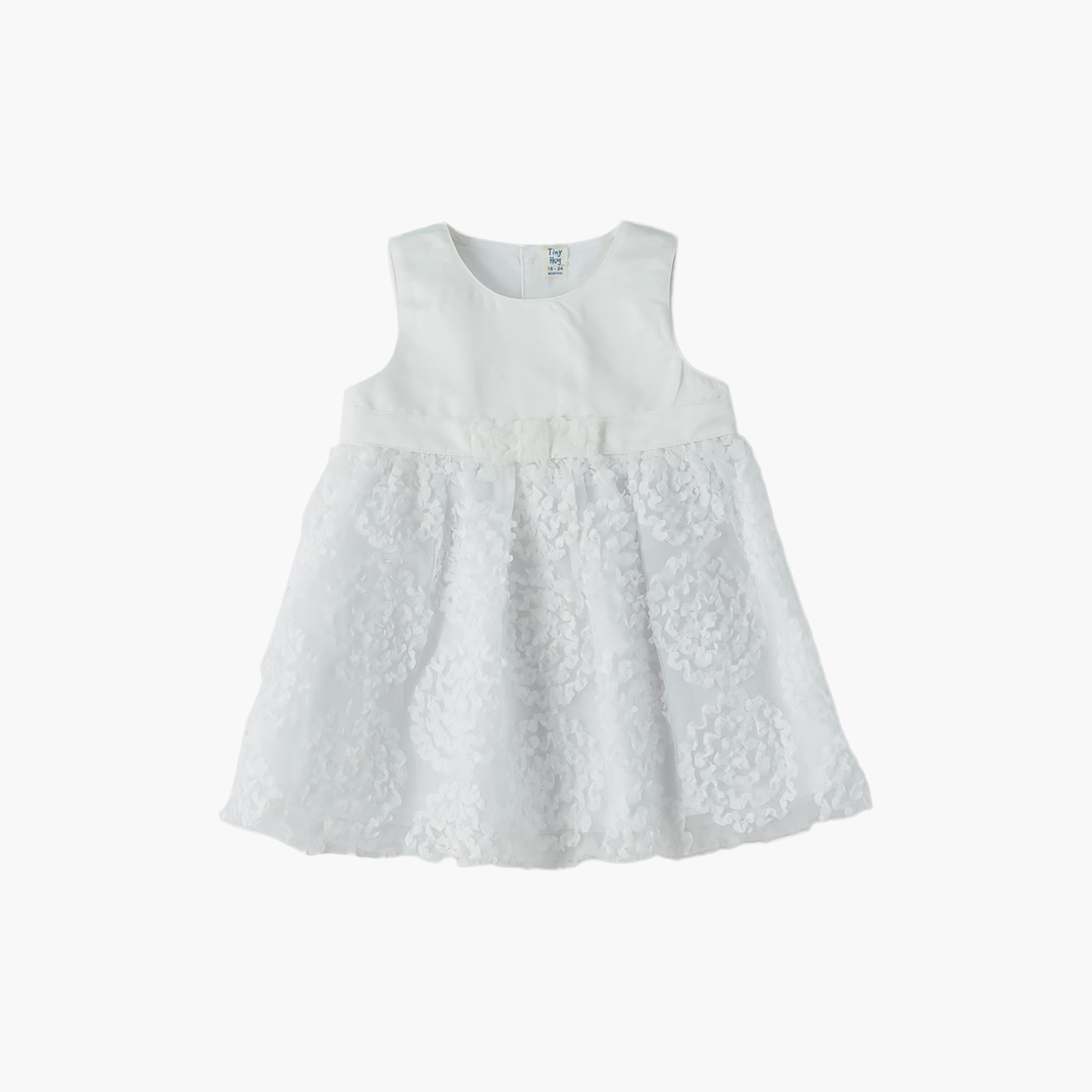 فستان قطن بدون أكمام بقوام بارز بنقشة زهور من يونيكيدز-baby-girls-clothing-dressesandjumpsuits-image-1